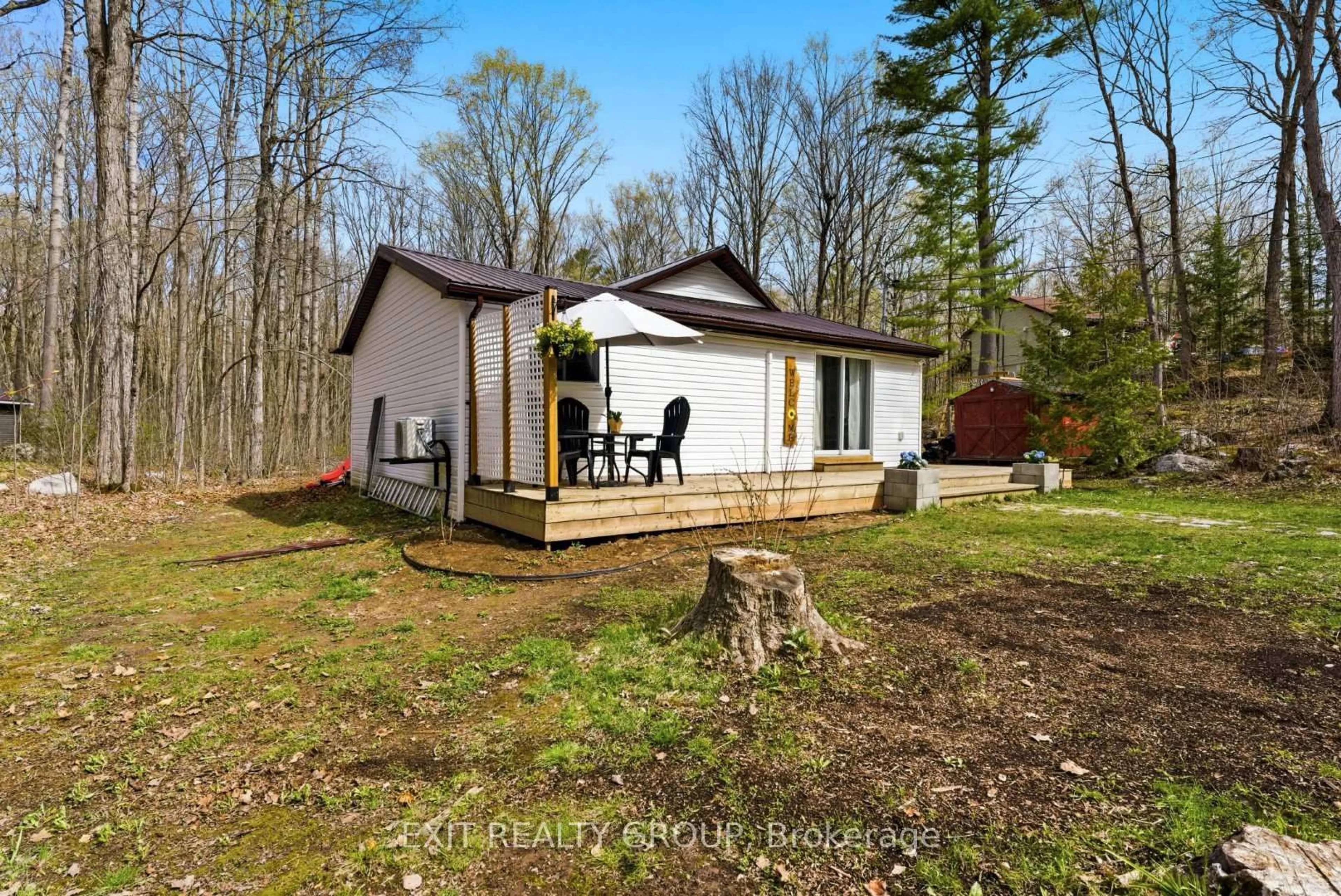 A pic from outside/outdoor area/front of a property/back of a property/a pic from drone, forest/trees view for 54 Paradise Rd, Limoges Ontario K0K 2M0