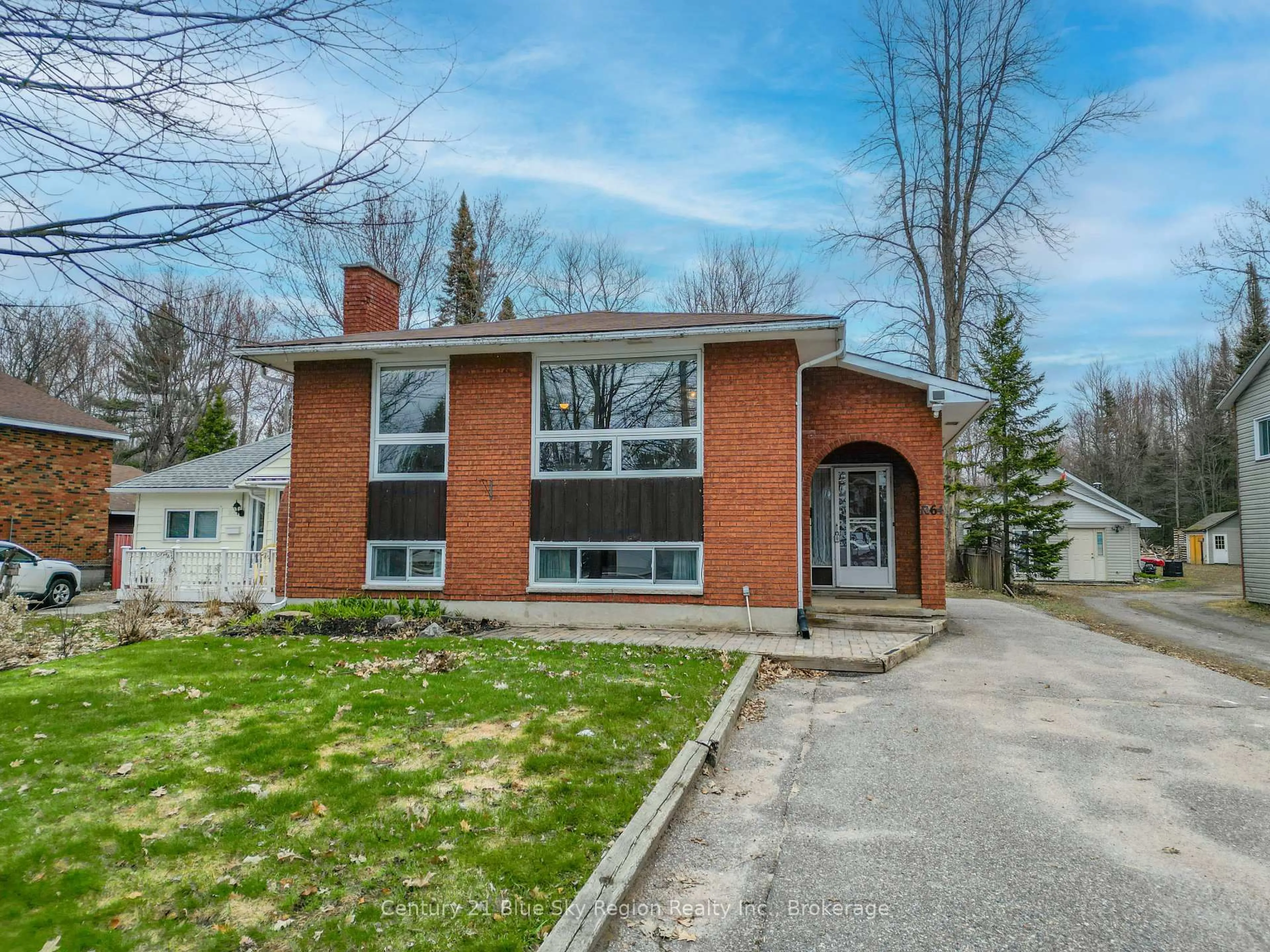 Home with brick exterior material, street for 1064 Premier Rd, North Bay Ontario P1A 2J1