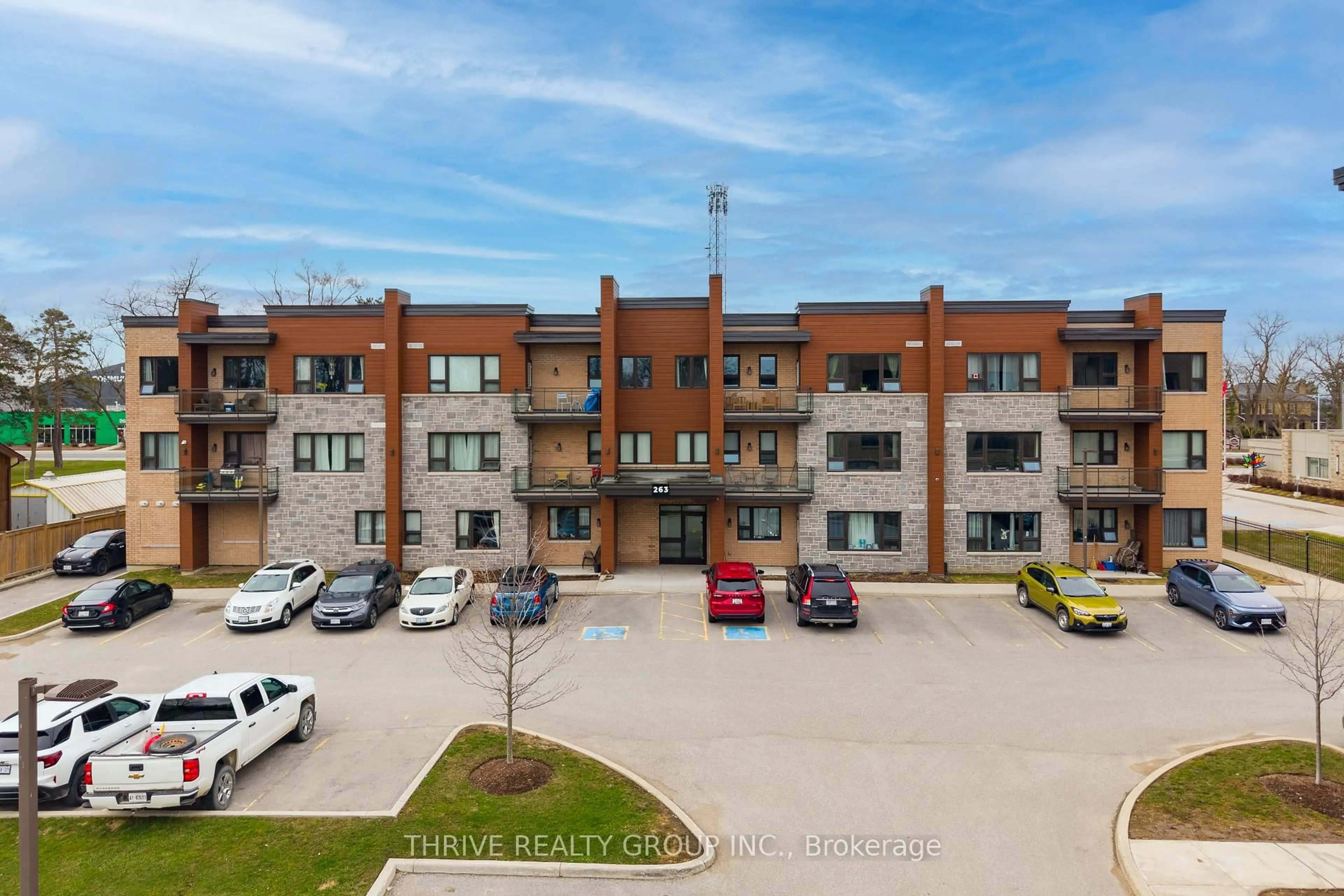A pic from outside/outdoor area/front of a property/back of a property/a pic from drone, building for 263 Butler St #306, Lucan Biddulph Ontario N0M 2J0