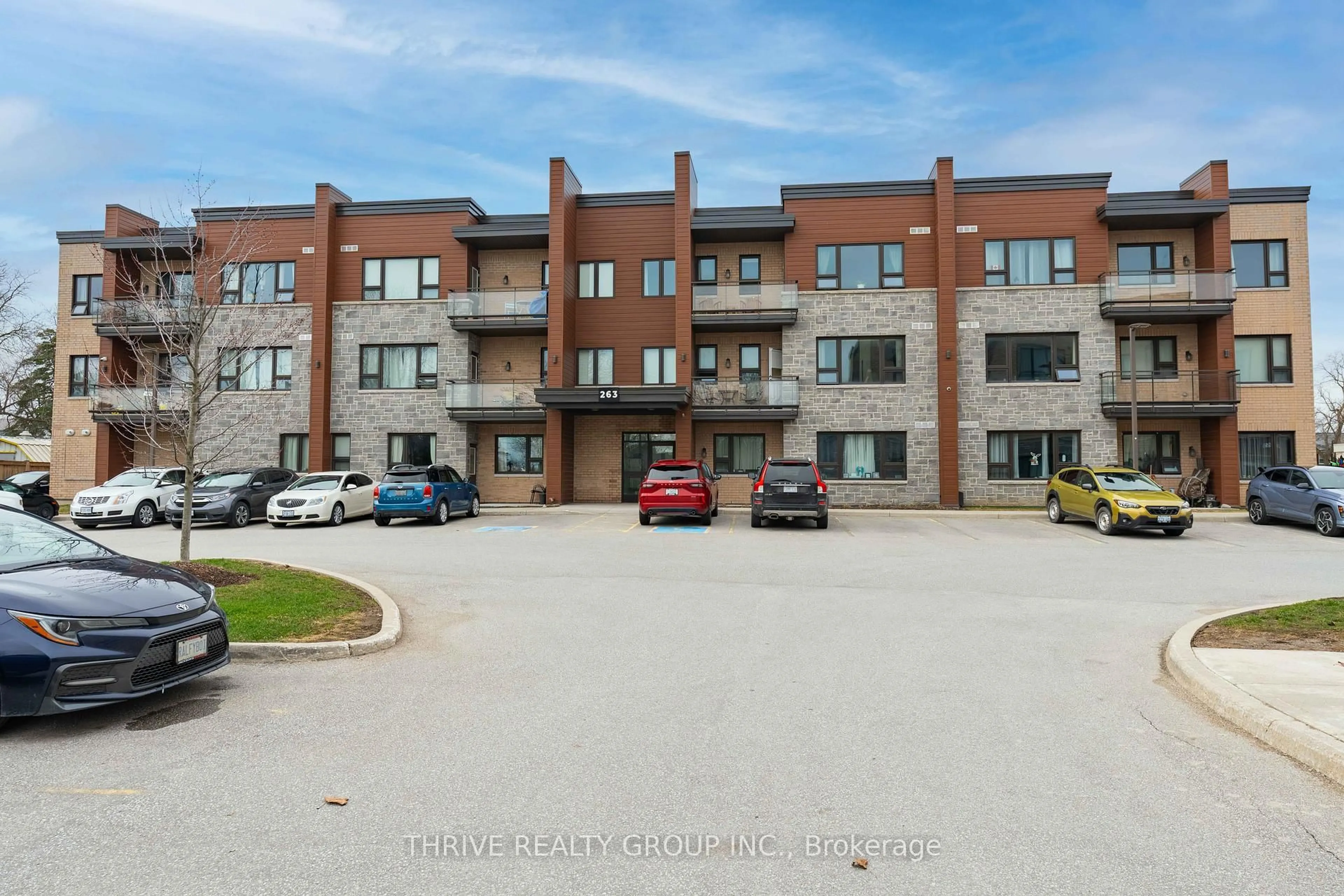 A pic from outside/outdoor area/front of a property/back of a property/a pic from drone, building for 263 Butler St #303, Lucan Biddulph Ontario N0M 2J0