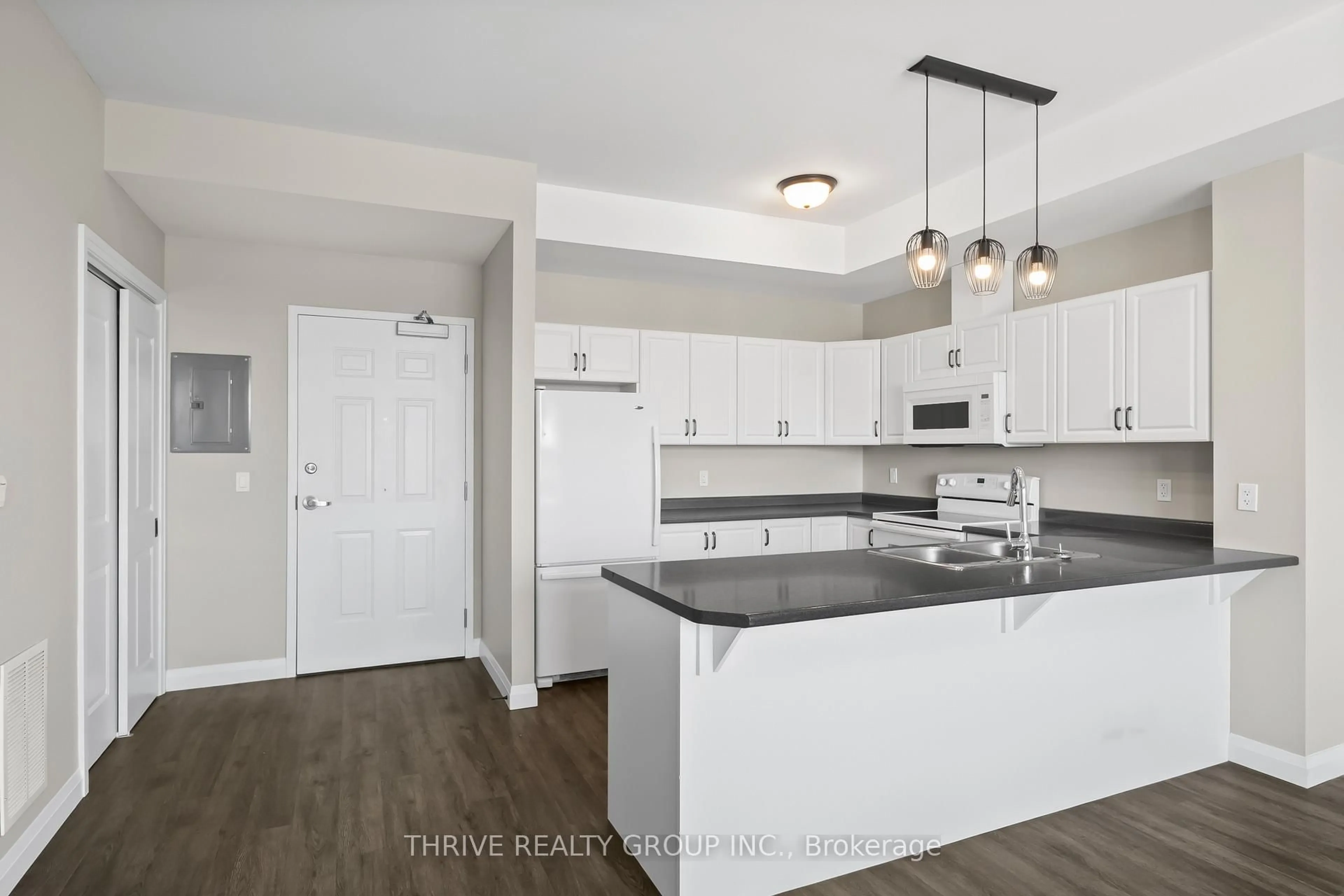 Open concept kitchen, unknown for 263 Butler St #303, Lucan Biddulph Ontario N0M 2J0