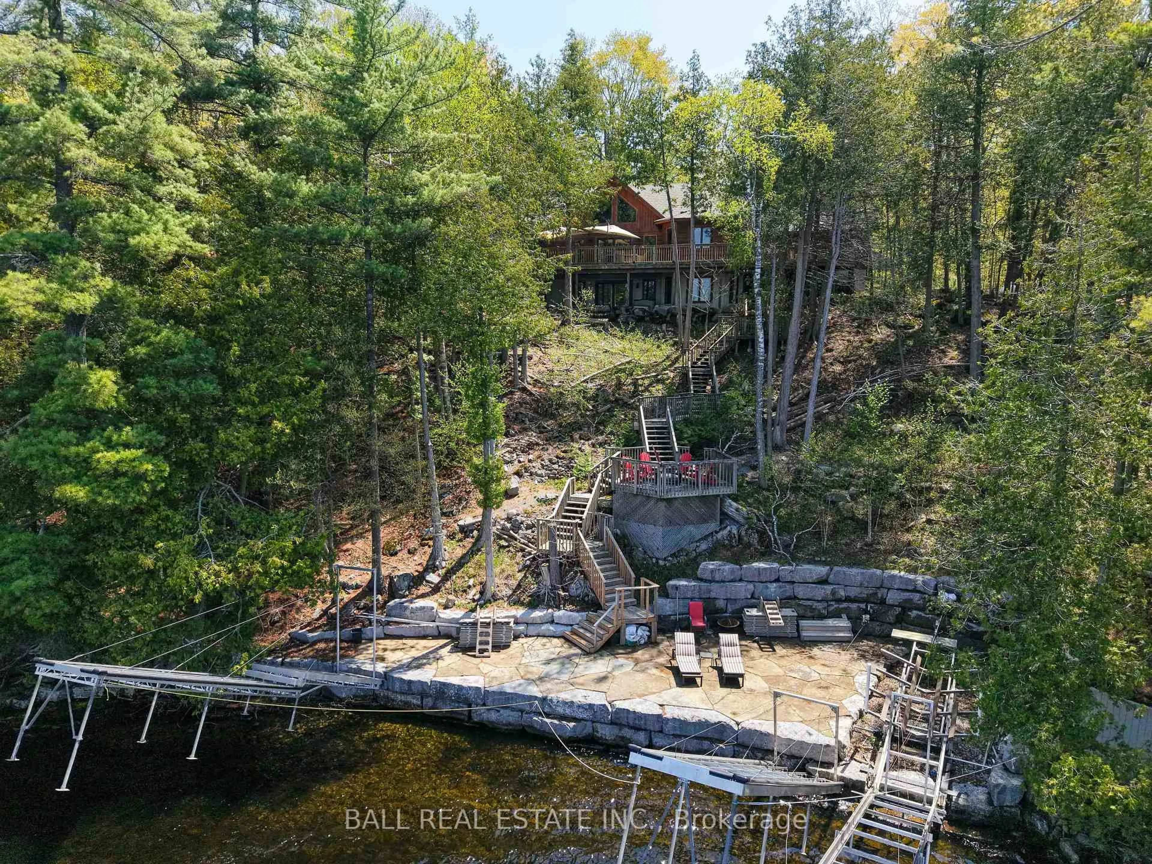 A pic from outside/outdoor area/front of a property/back of a property/a pic from drone, water/lake/river/ocean view for 61 Ted's Lane, Trent Lakes Ontario K0L 1J0
