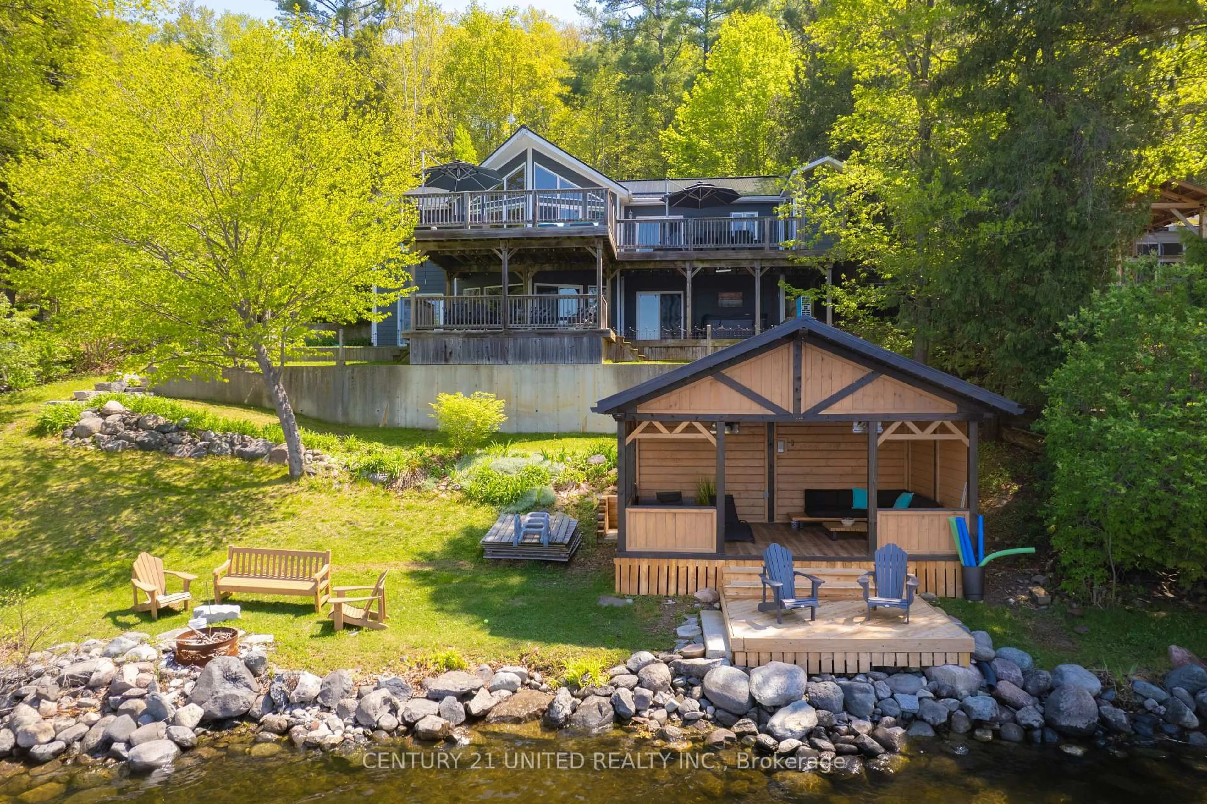 A pic from outside/outdoor area/front of a property/back of a property/a pic from drone, water/lake/river/ocean view for 64 Sunnybrae Lane, Trent Hills Ontario K0L 1Y0