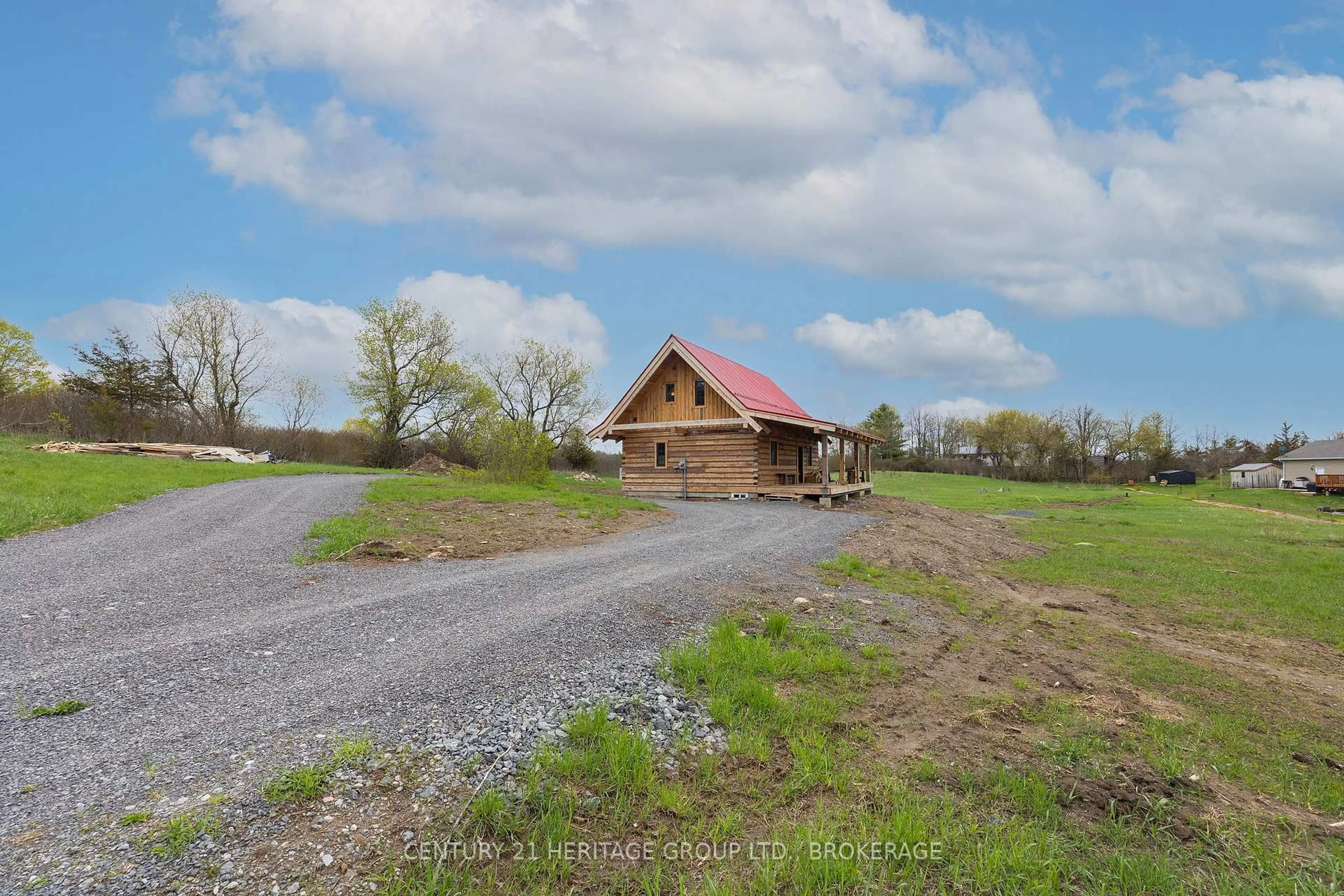 A pic from outside/outdoor area/front of a property/back of a property/a pic from drone, building for 22 Flynn Rd, Tweed Ontario K0K 2L0