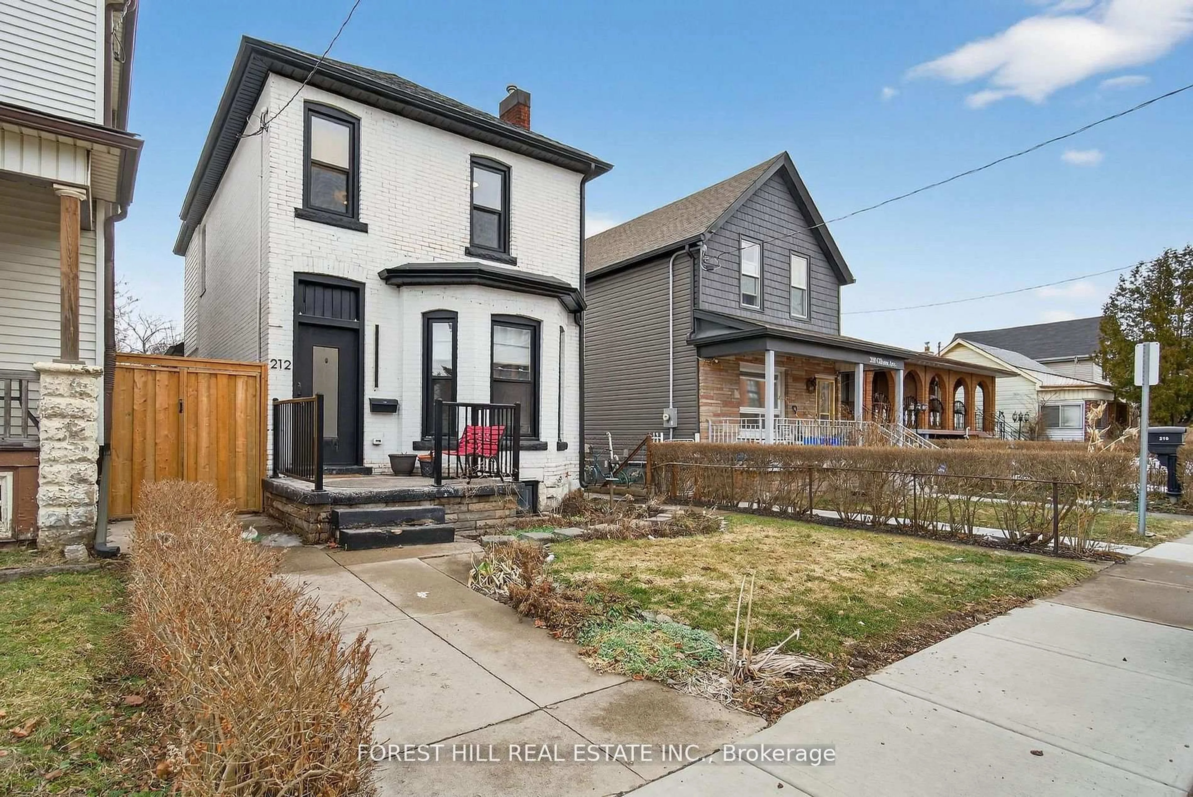 Home with brick exterior material, street for 212 Gibson Ave, Hamilton Ontario L8L 6K1