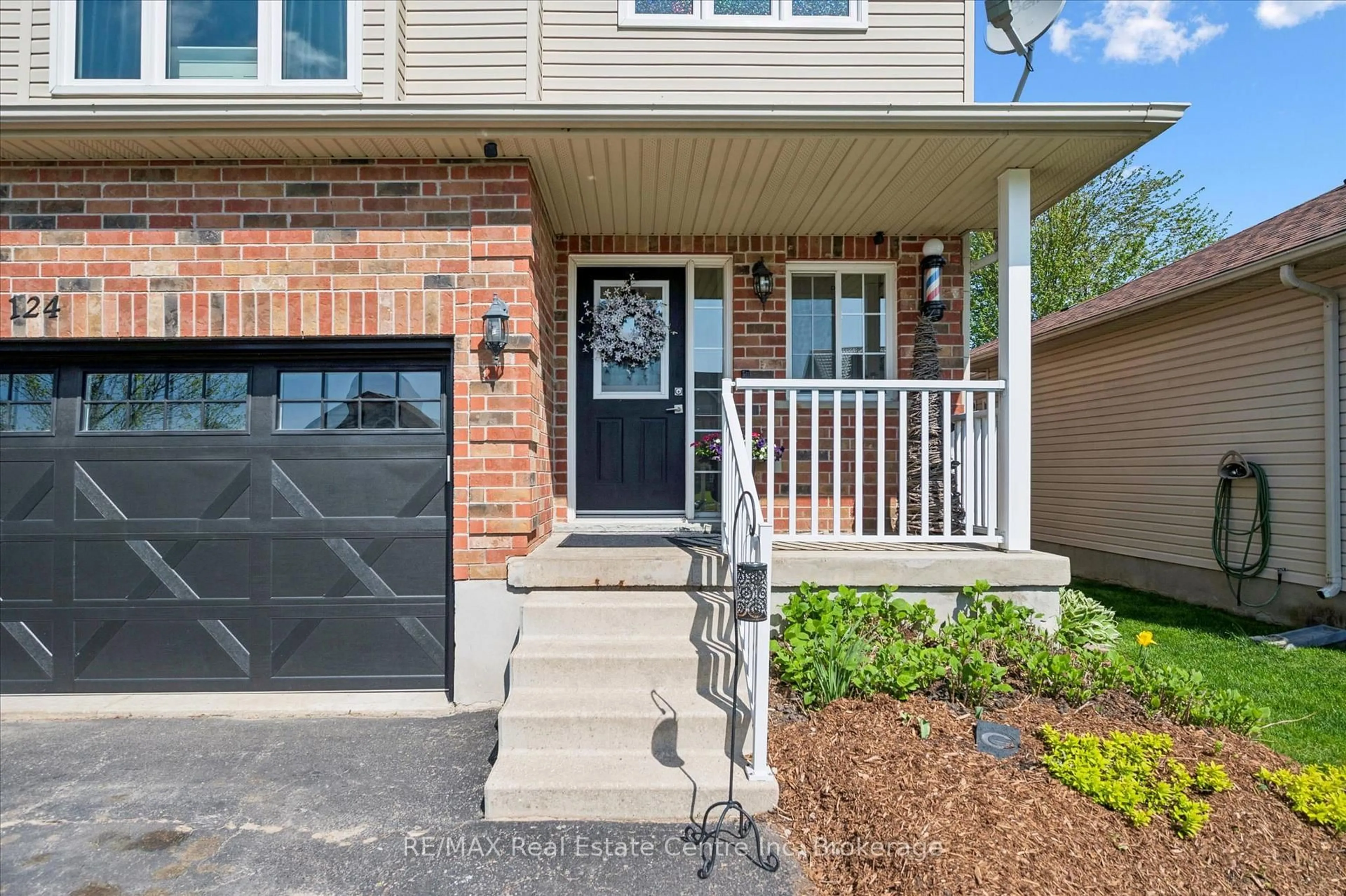 Home with brick exterior material, street for 124 GIBBONS Dr, Centre Wellington Ontario N1M 3W2
