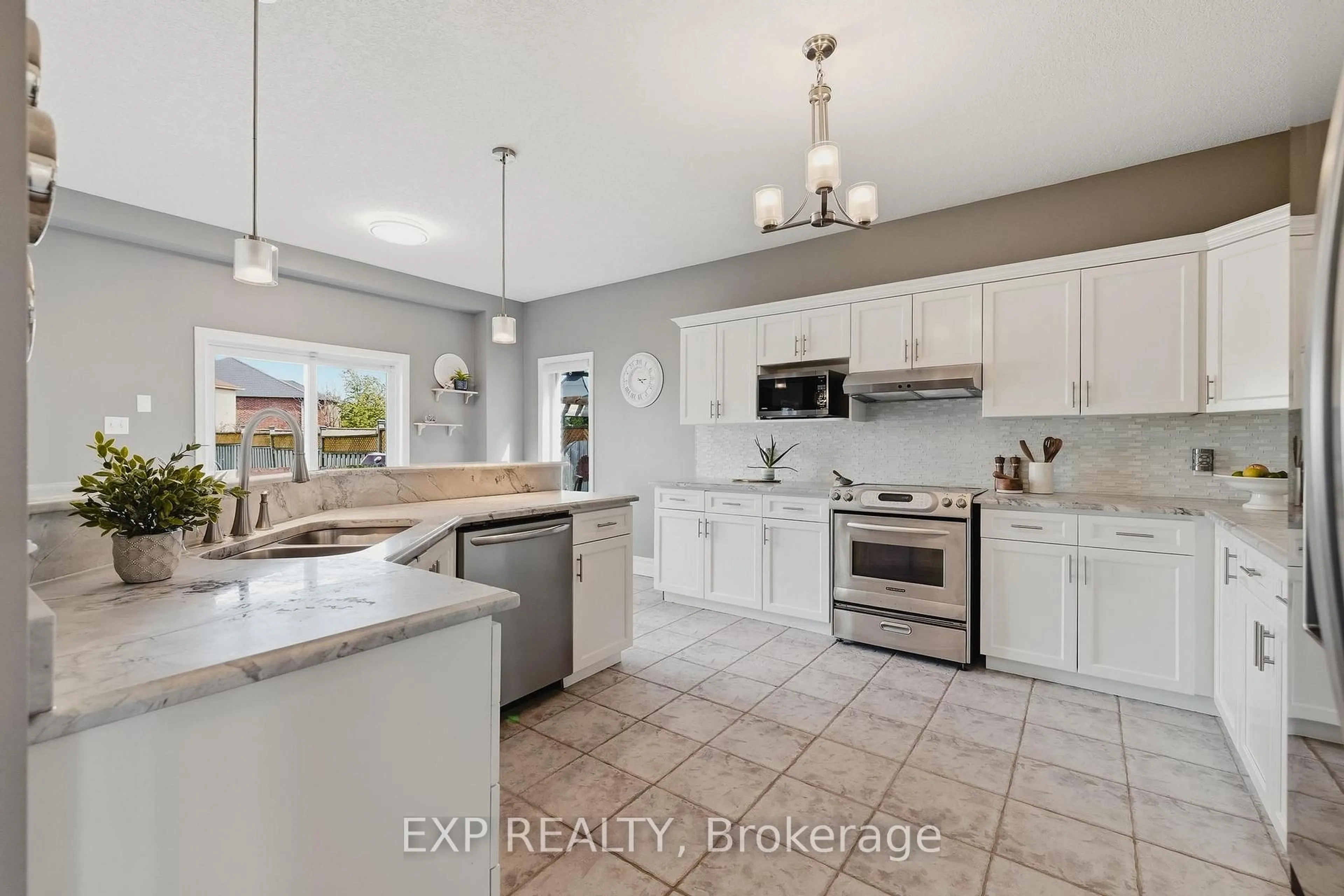 Open concept kitchen, ceramic/tile floor for 606 Doon Dr, Kitchener Ontario N2P 2X4