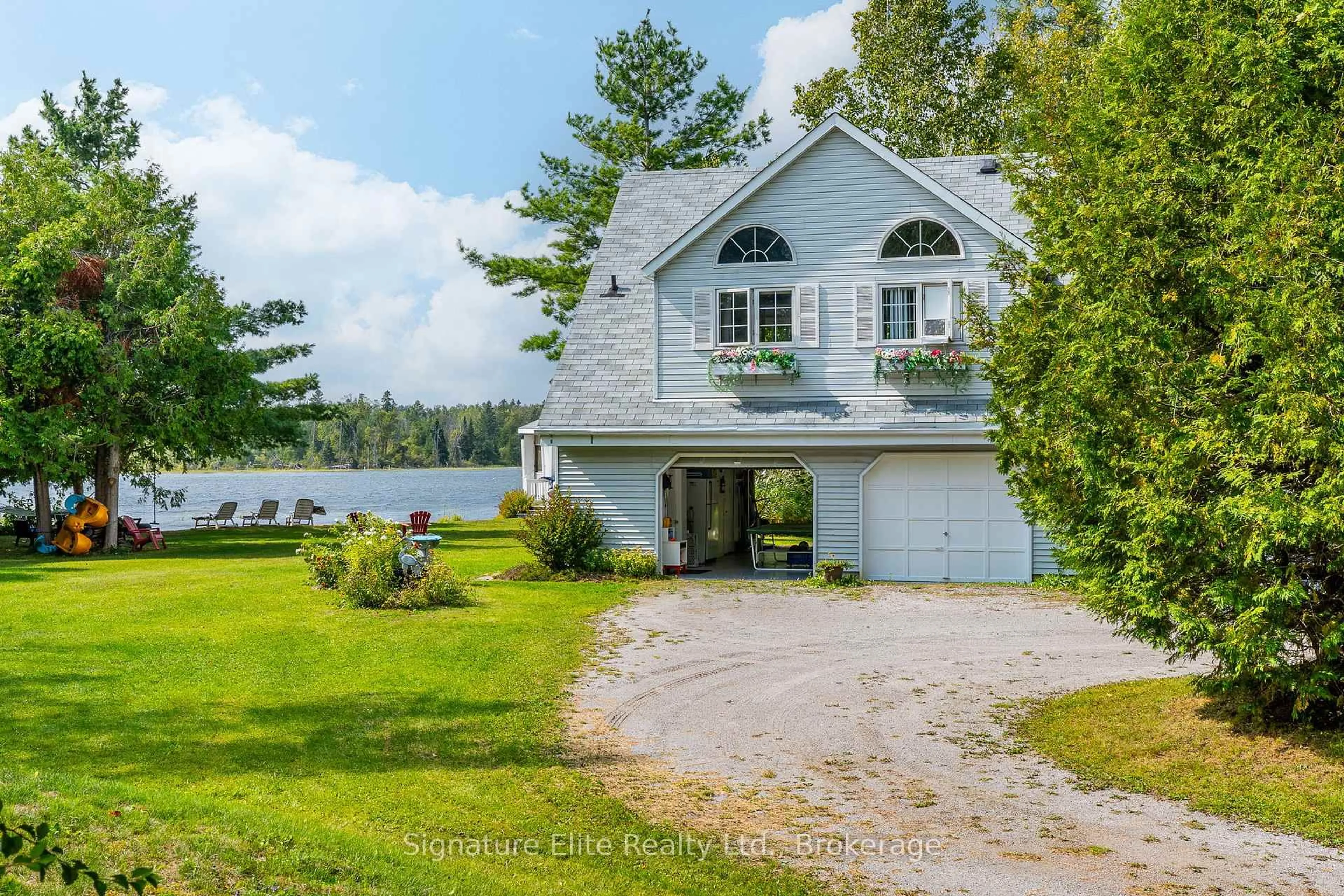 A pic from outside/outdoor area/front of a property/back of a property/a pic from drone, water/lake/river/ocean view for 41 Duncombe Dr, Kawartha Lakes Ontario K0M 1K0