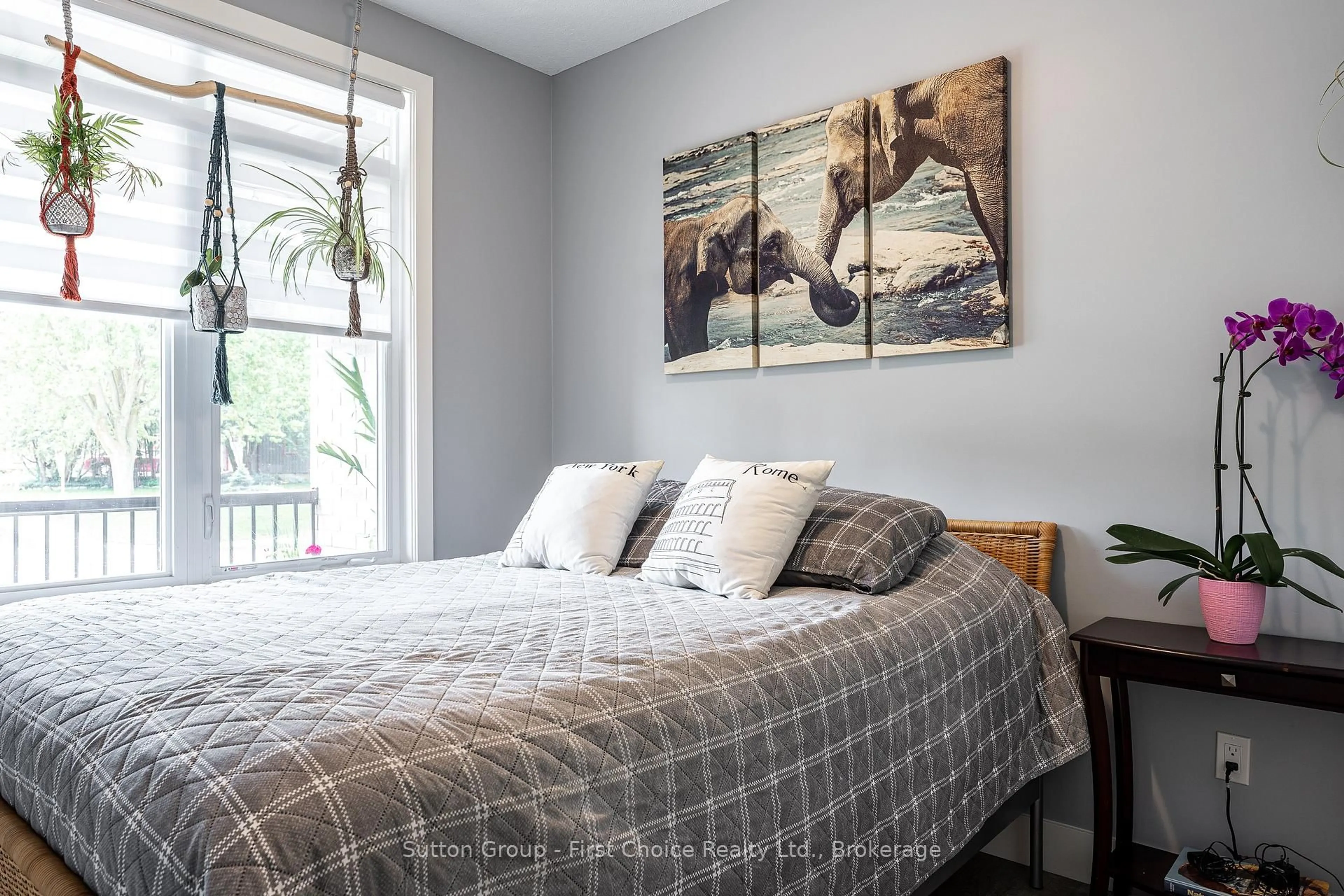 Bedroom with bed, wood/laminate floor for 135 Egan Ave, St. Marys Ontario N4X 0C4
