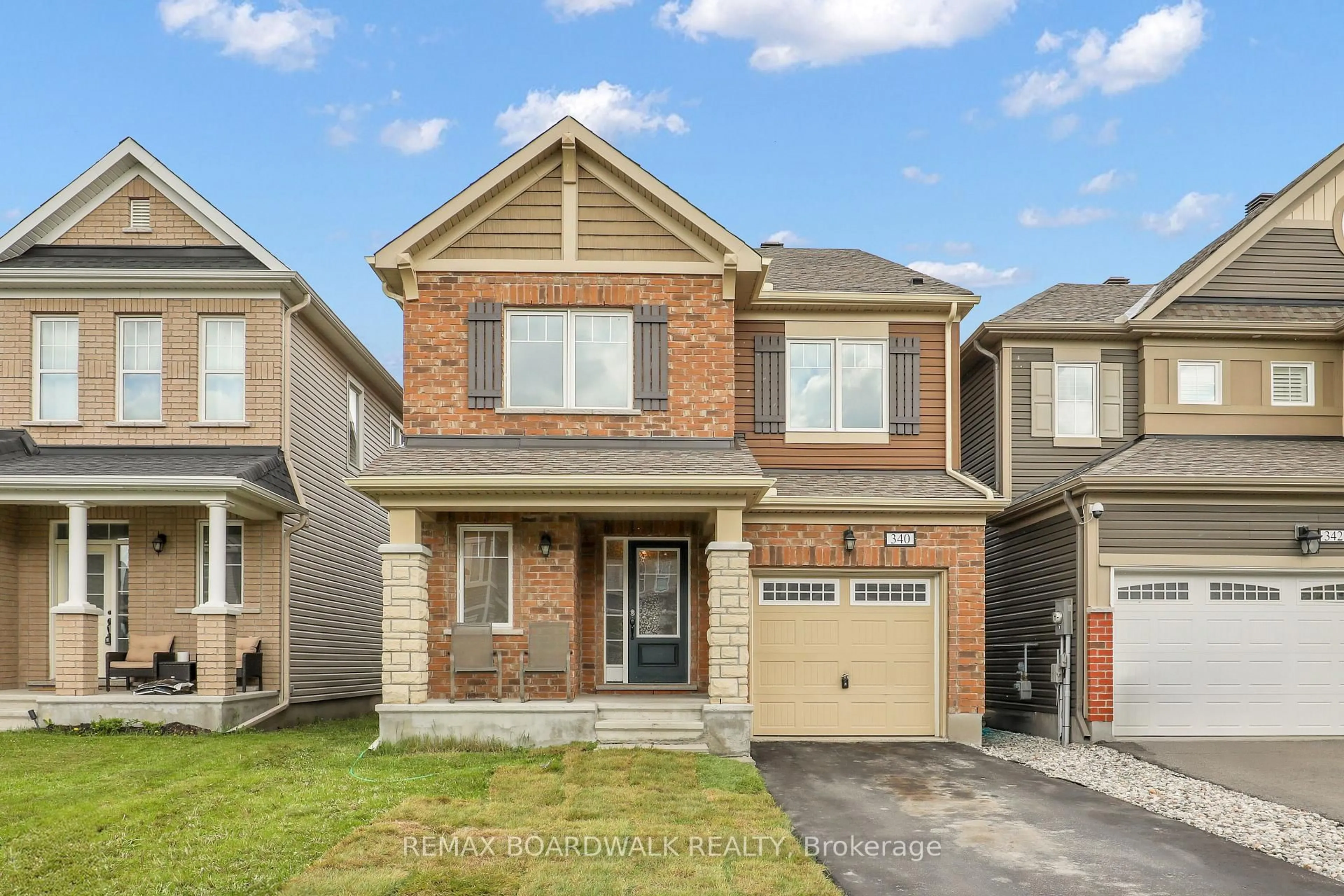 Home with brick exterior material, street for 340 Sweetclover Way, Ottawa Ontario K4A 1E6