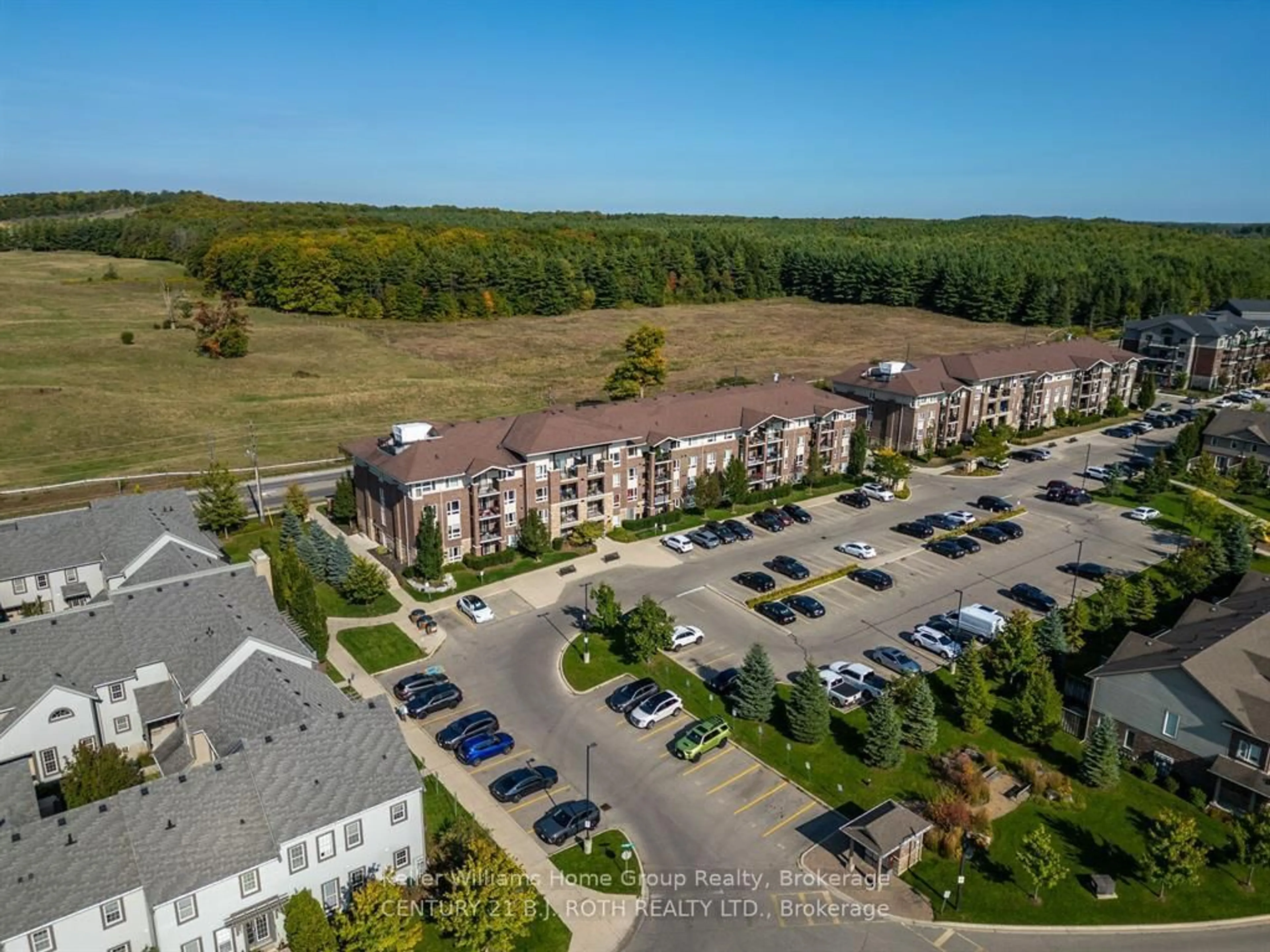 A pic from outside/outdoor area/front of a property/back of a property/a pic from drone, unknown for 67 Kingsbury Sq #303, Guelph Ontario N1L 0L3