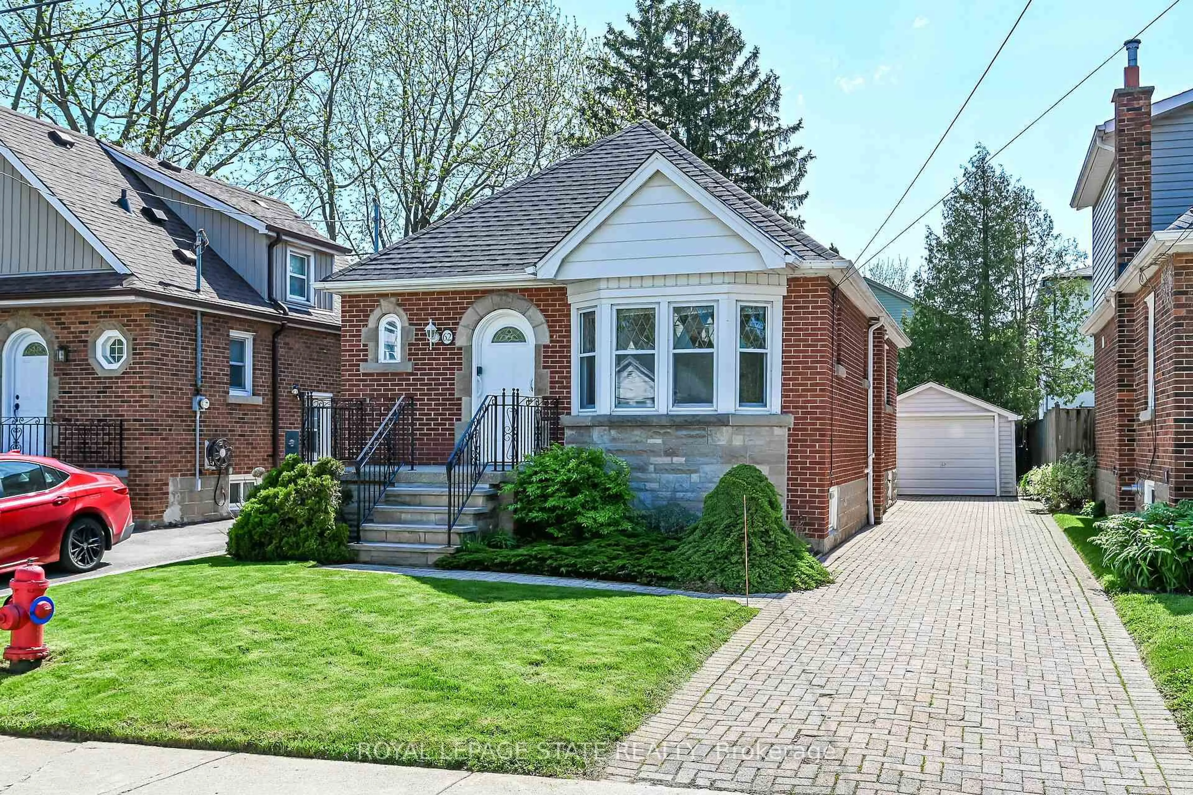 Home with brick exterior material, street for 62 Uplands Ave, Hamilton Ontario L8S 3X8