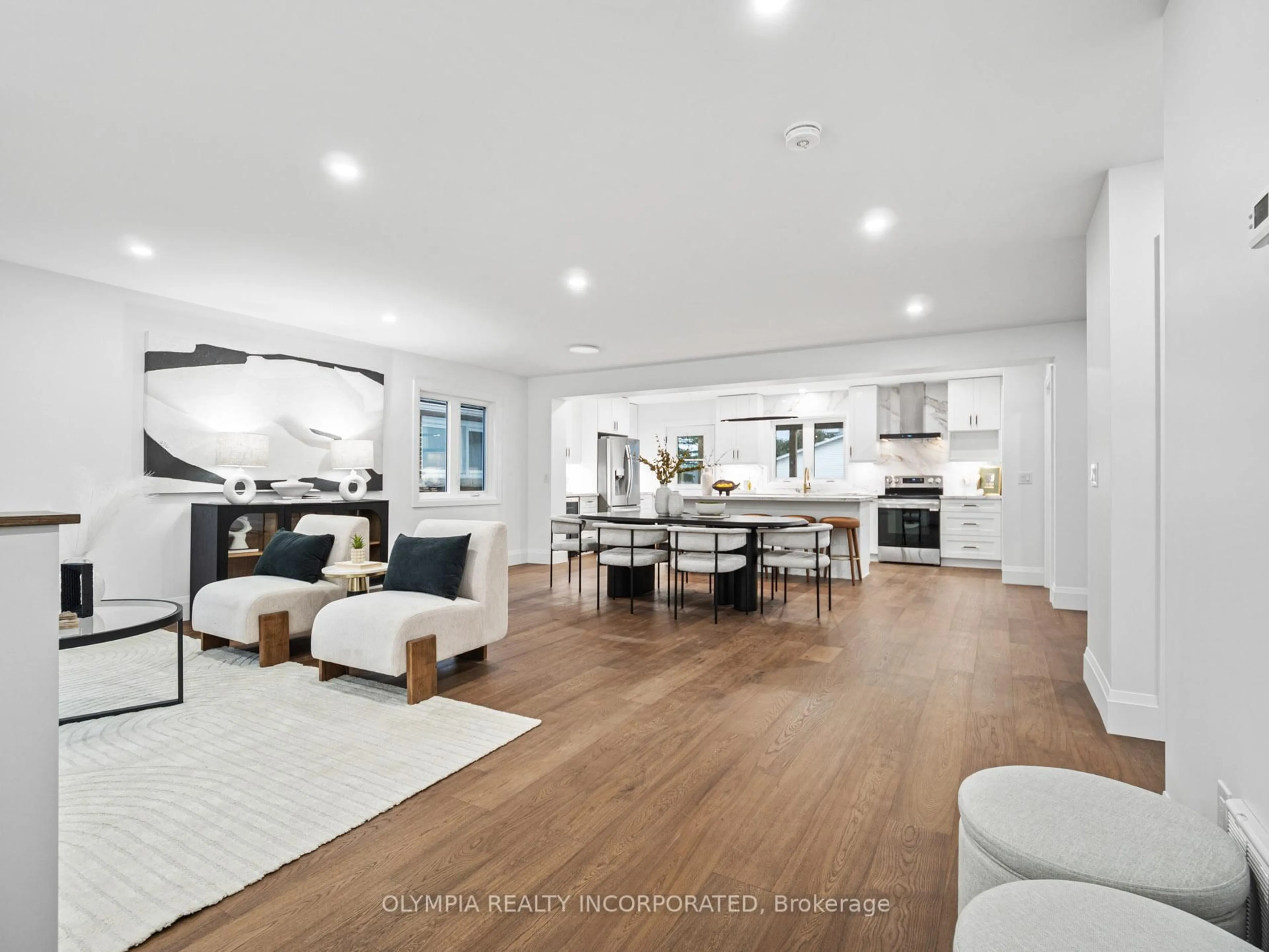Open concept kitchen, wood/laminate floor for 1110 Vansickle Rd, St. Catharines Ontario L2S 2Z3