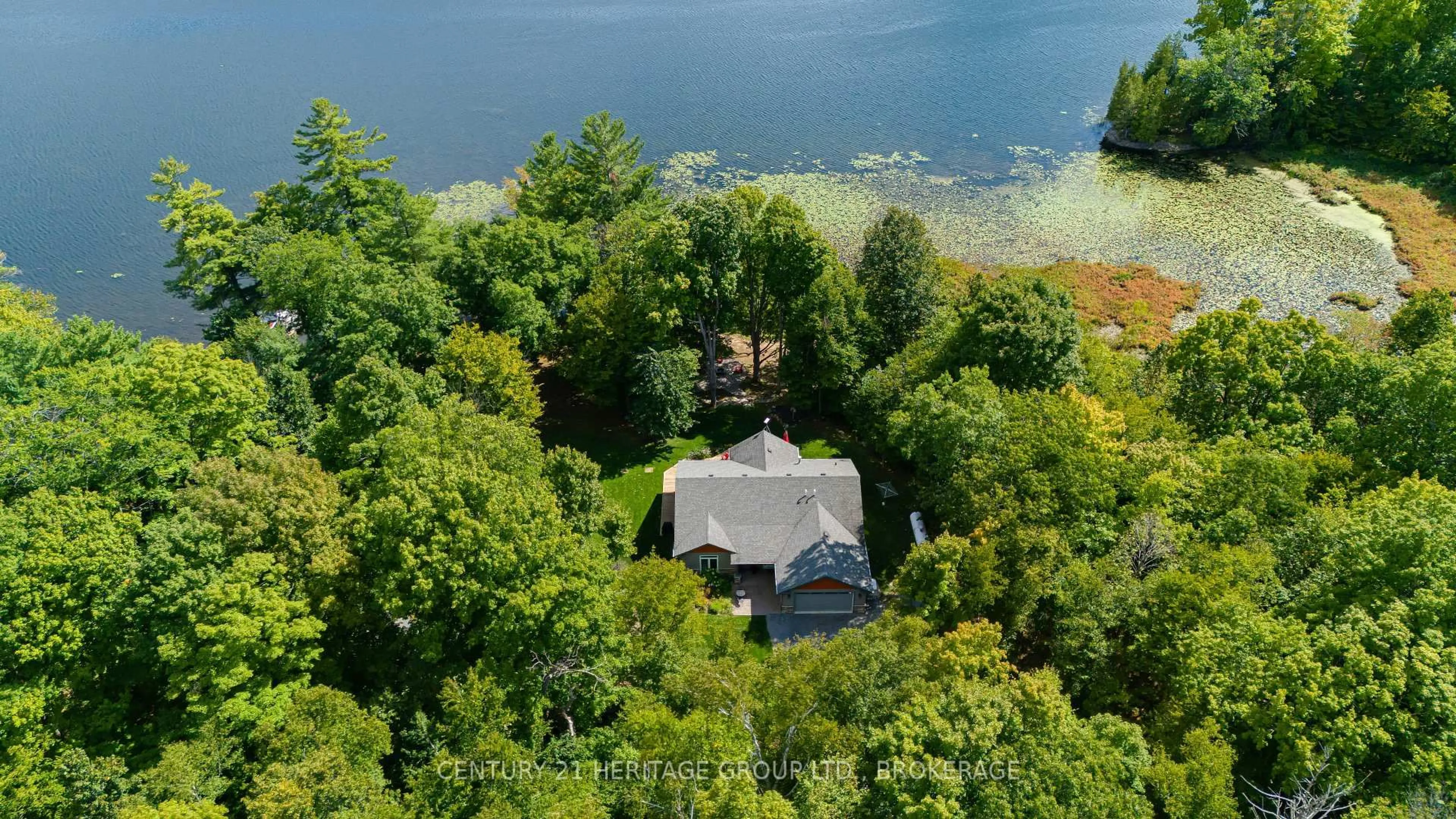 A pic from outside/outdoor area/front of a property/back of a property/a pic from drone, water/lake/river/ocean view for 627 Stafford Lane, Seeley's Bay Ontario K0H 2N0