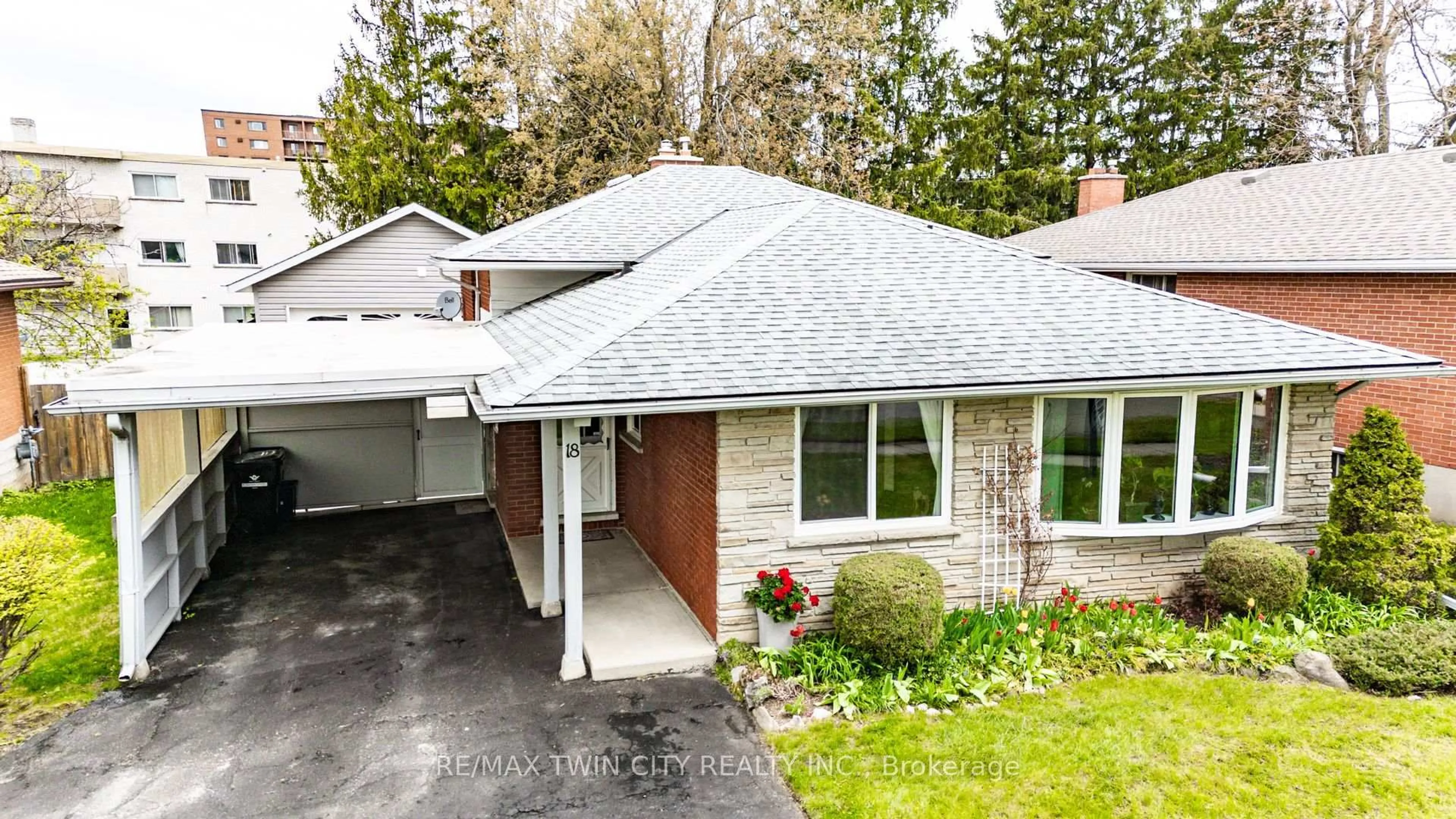 Home with brick exterior material, street for 18 QUEENSTON Cres, Kitchener Ontario N2B 2V5