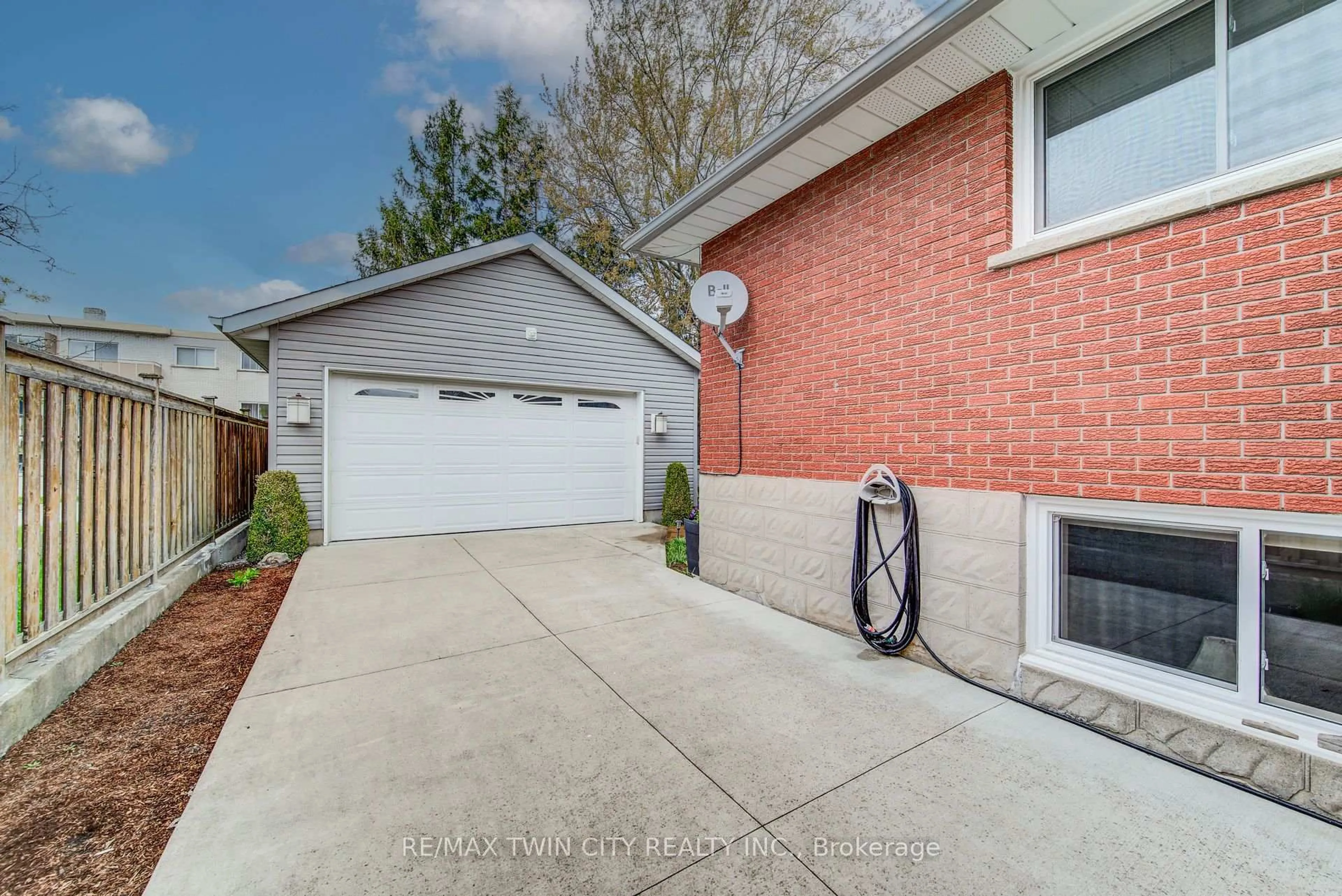 Home with brick exterior material, street for 18 QUEENSTON Cres, Kitchener Ontario N2B 2V5