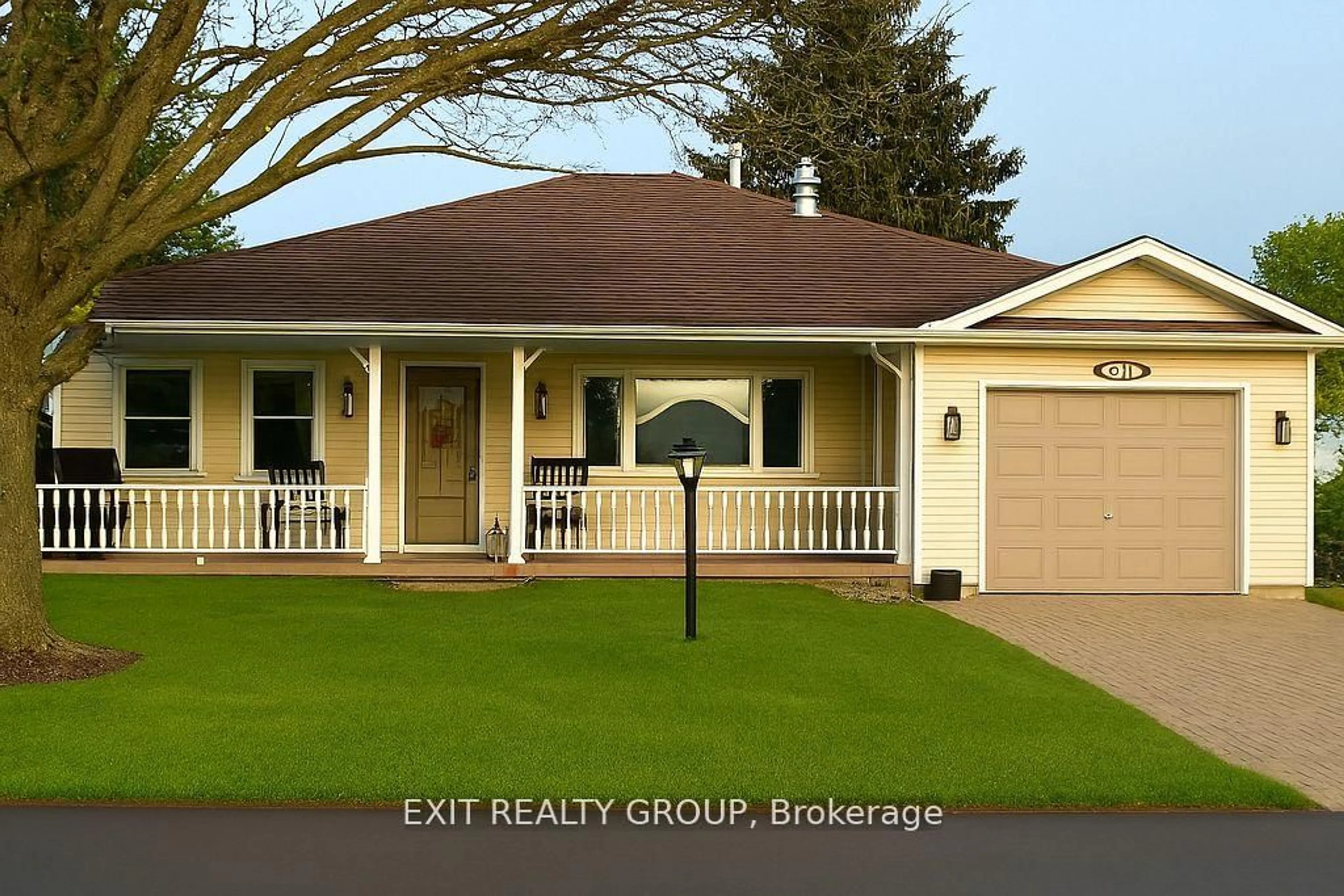 Home with vinyl exterior material, street for 1 Quaker Crt, Prince Edward County Ontario K0K 3L0