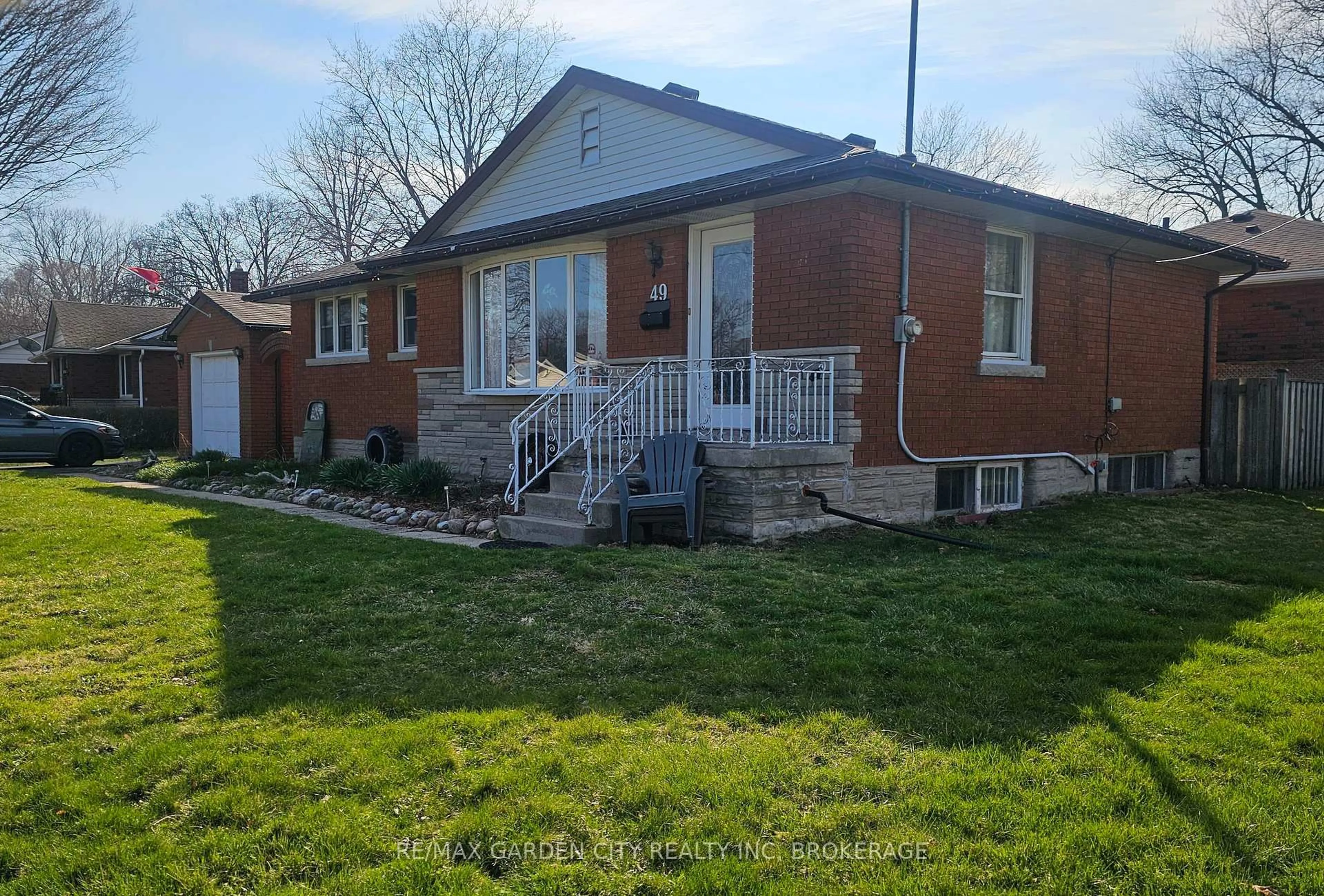 Home with brick exterior material, street for 49 Whittaker Ave, Grimsby Ontario L3M 3J3