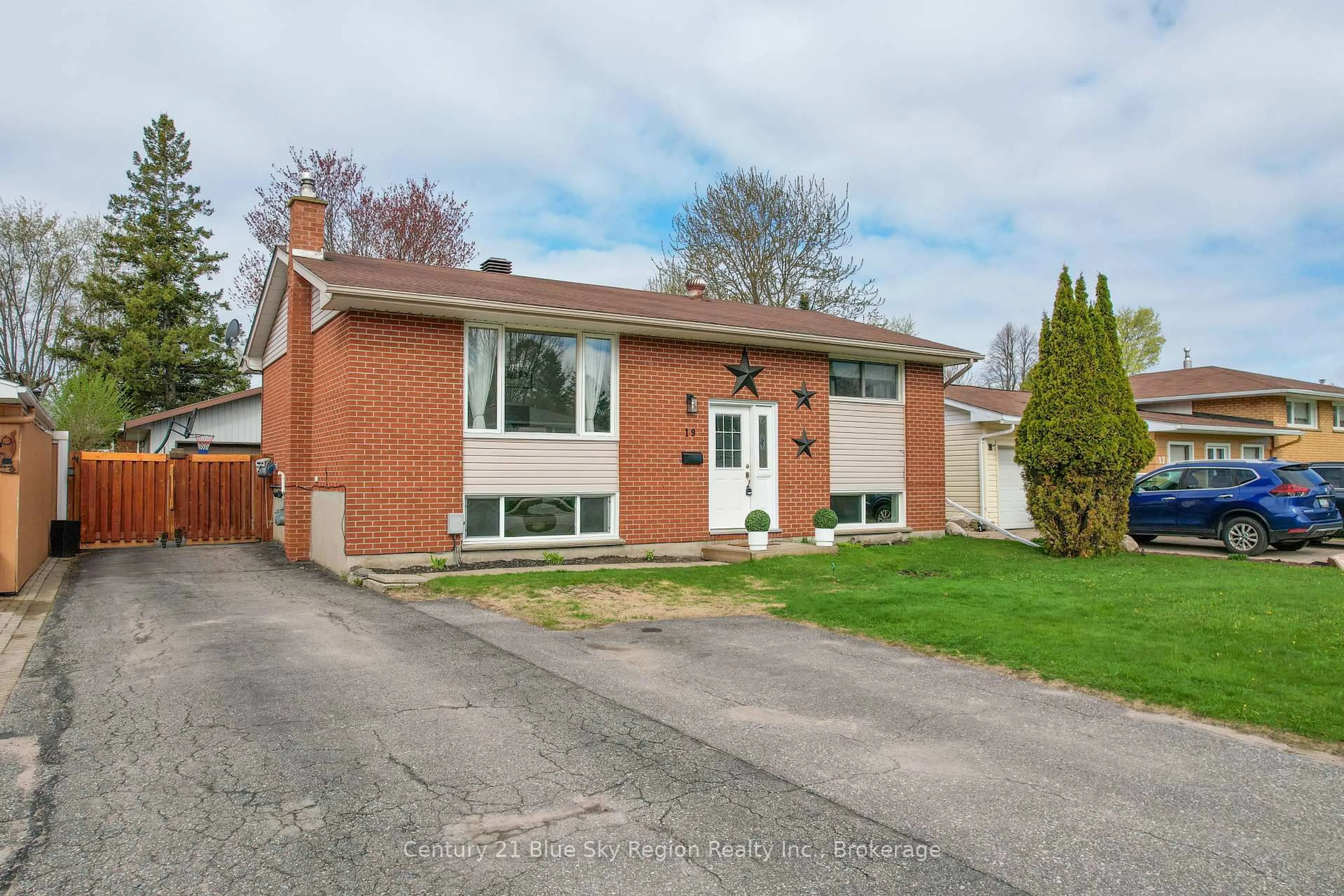 Home with brick exterior material, street for 19 Marshall Park Dr, North Bay Ontario P1A 2N8
