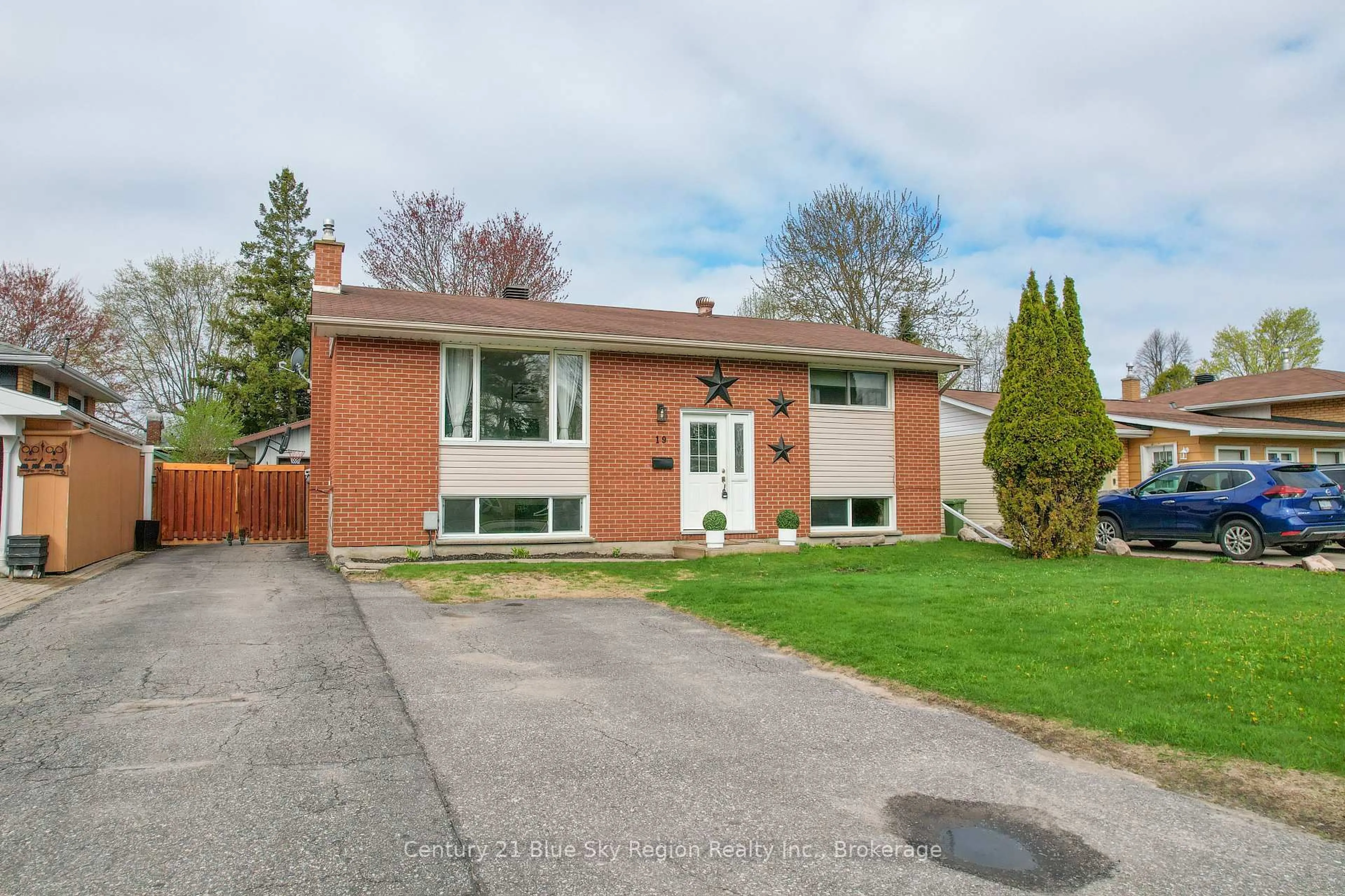 Home with brick exterior material, street for 19 Marshall Park Dr, North Bay Ontario P1A 2N8