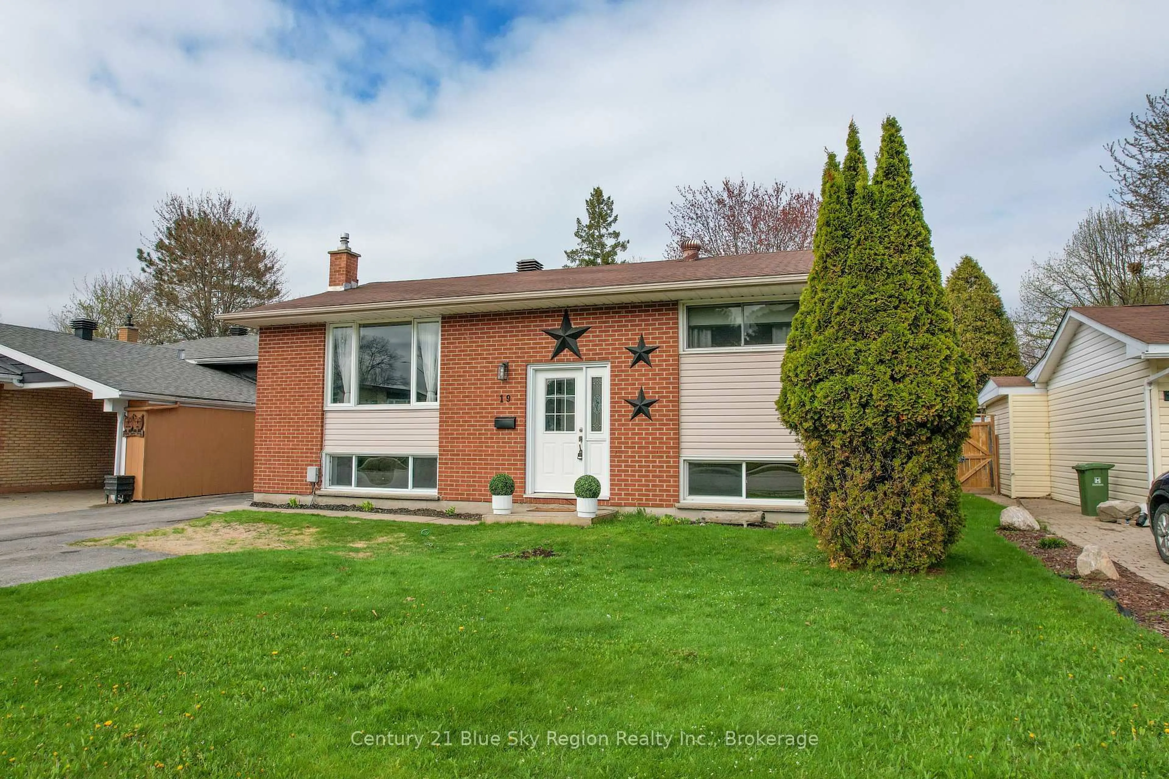 Home with brick exterior material, street for 19 Marshall Park Dr, North Bay Ontario P1A 2N8