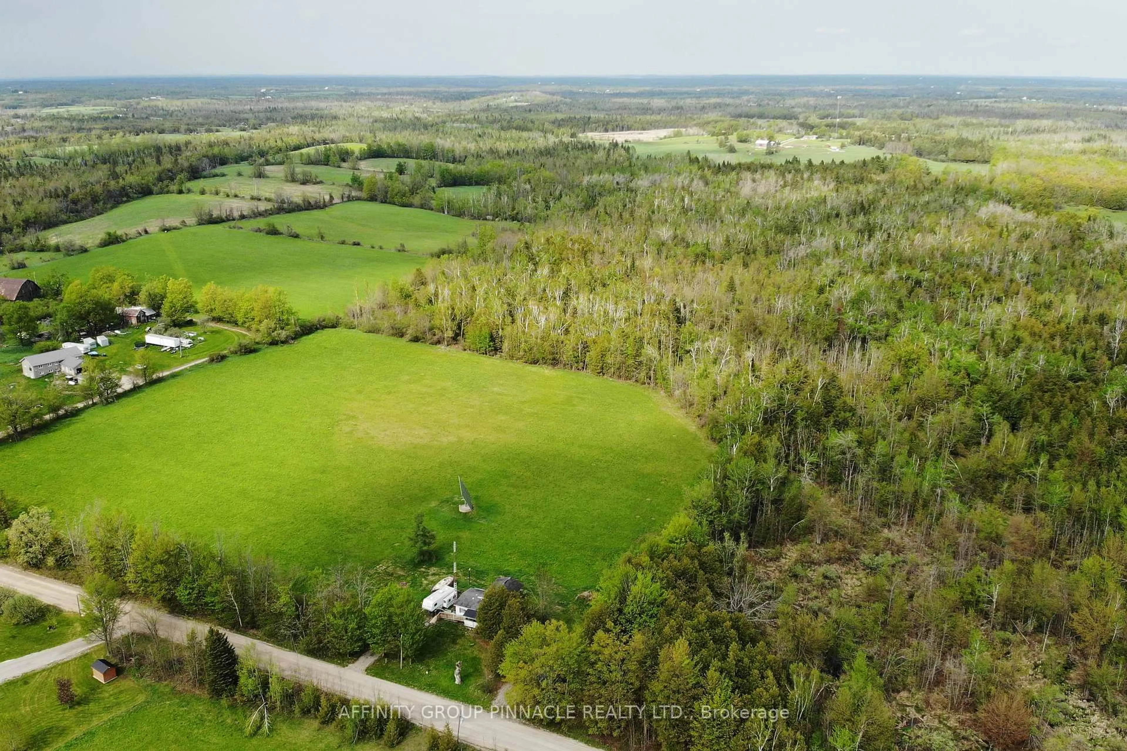A pic from outside/outdoor area/front of a property/back of a property/a pic from drone, forest/trees view for 19 Patterson Rd, Kawartha Lakes Ontario K0M 1N0