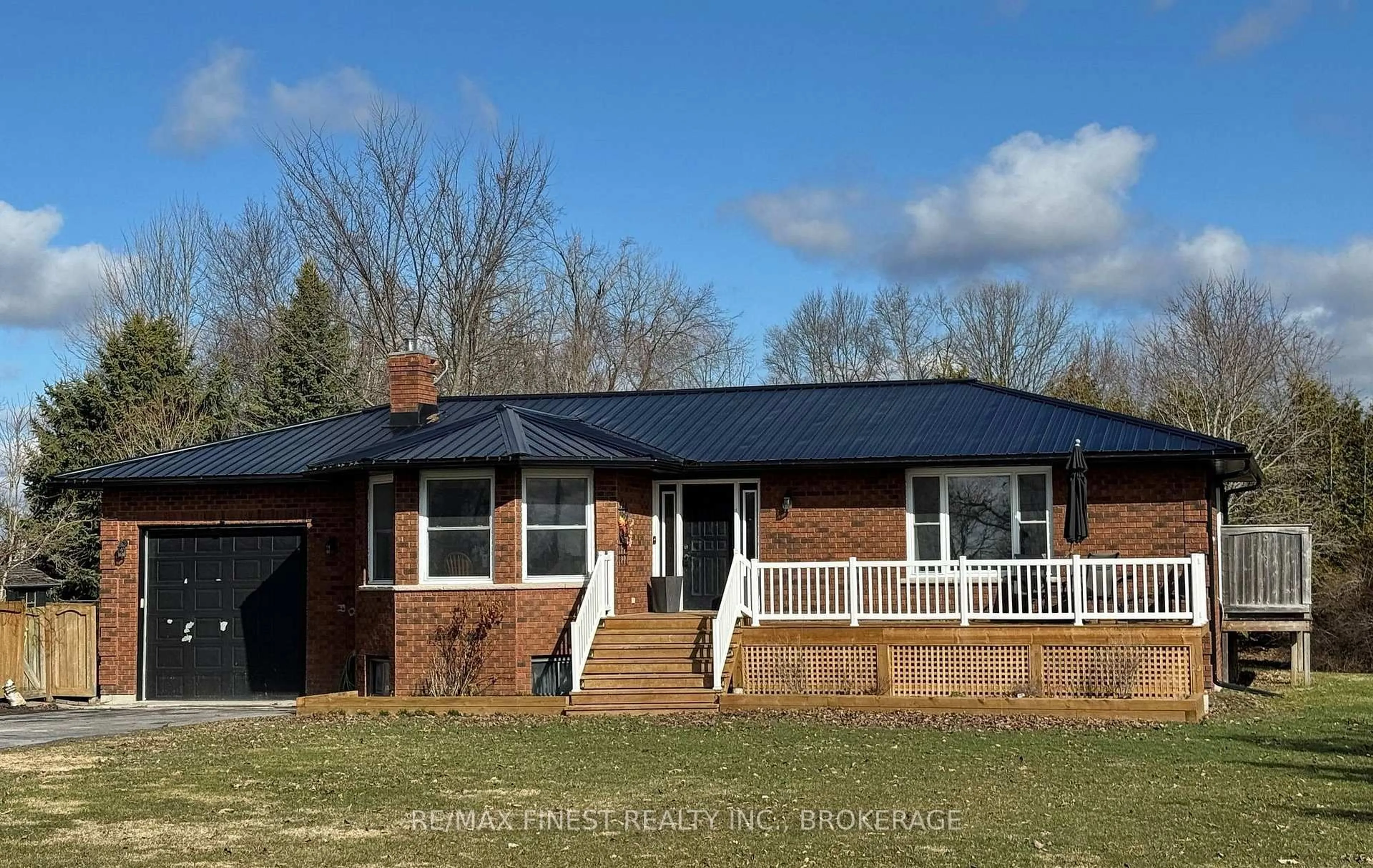 Home with vinyl exterior material, street for 2055 Switzerville Rd, Loyalist Ontario K7R 3K9