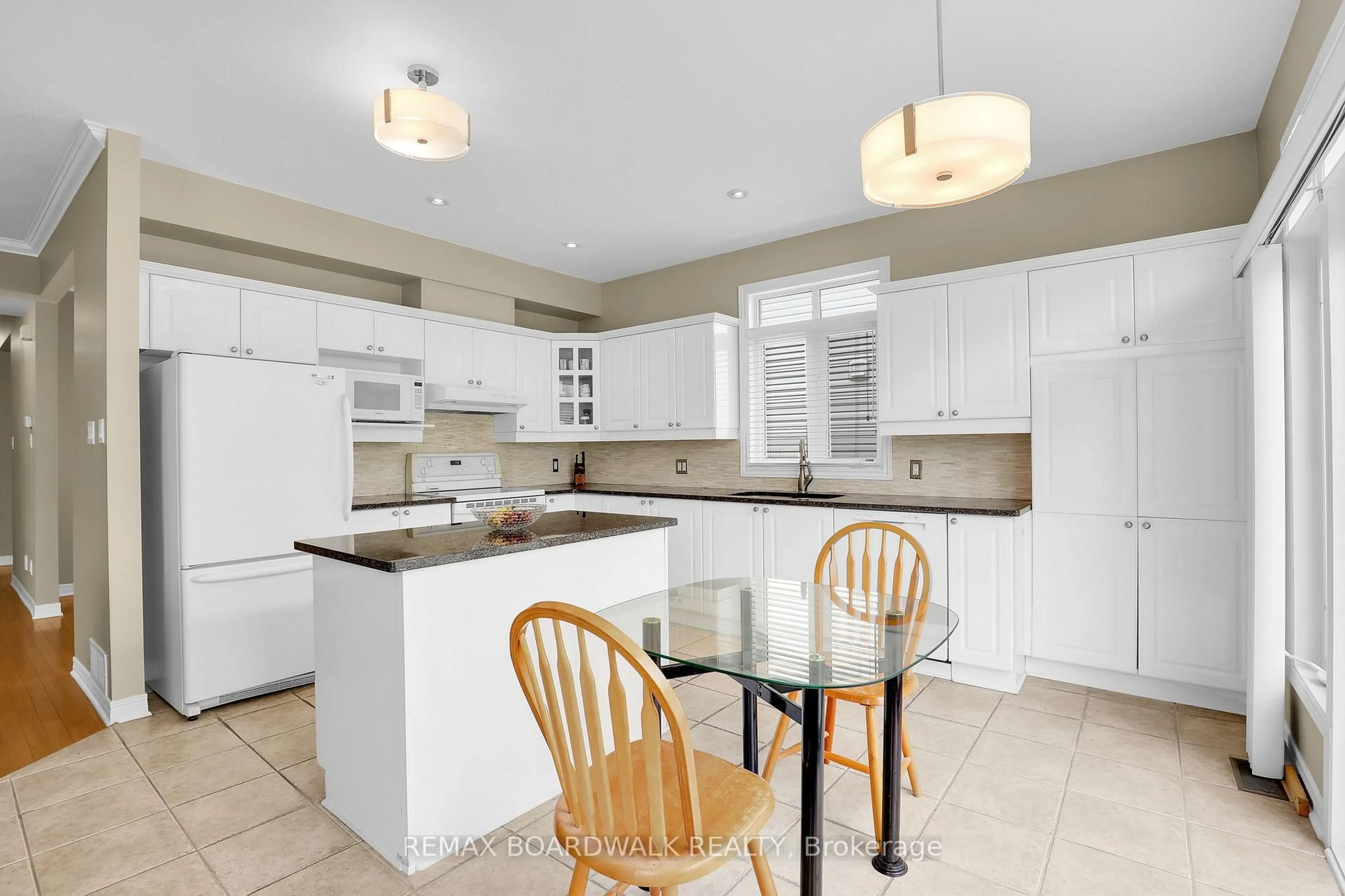 Open concept kitchen, ceramic/tile floor for 82 Upney Dr, Ottawa Ontario K2J 5G6