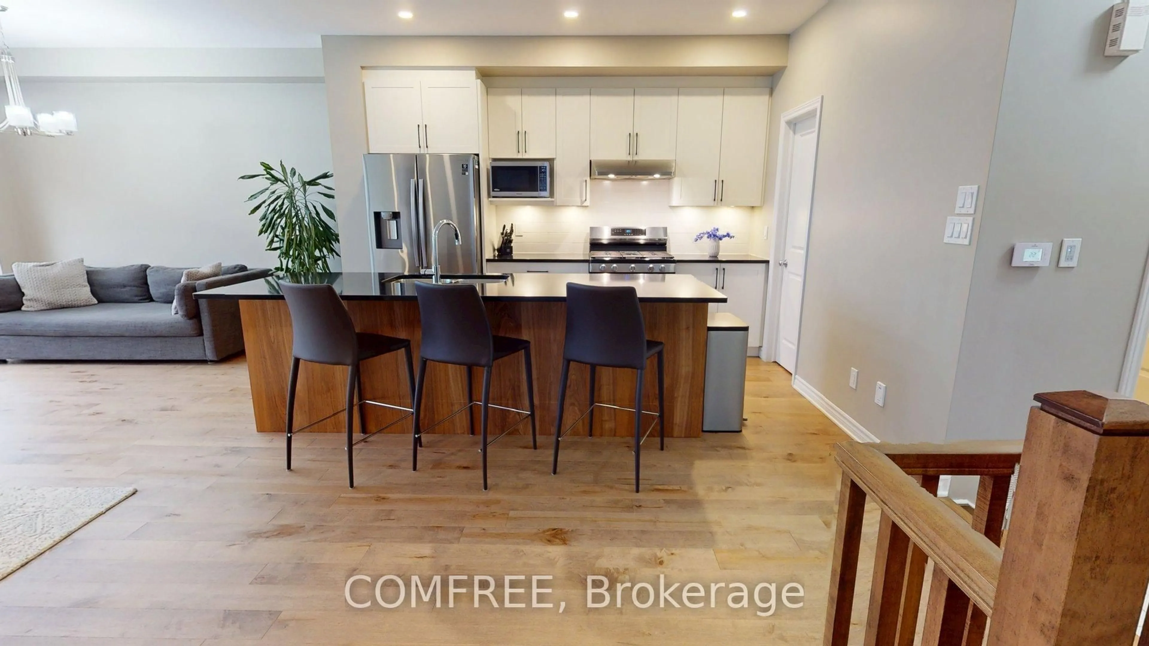 Open concept kitchen, wood/laminate floor for 881 Antonio Farley St, Orleans Ontario K4A 5K1