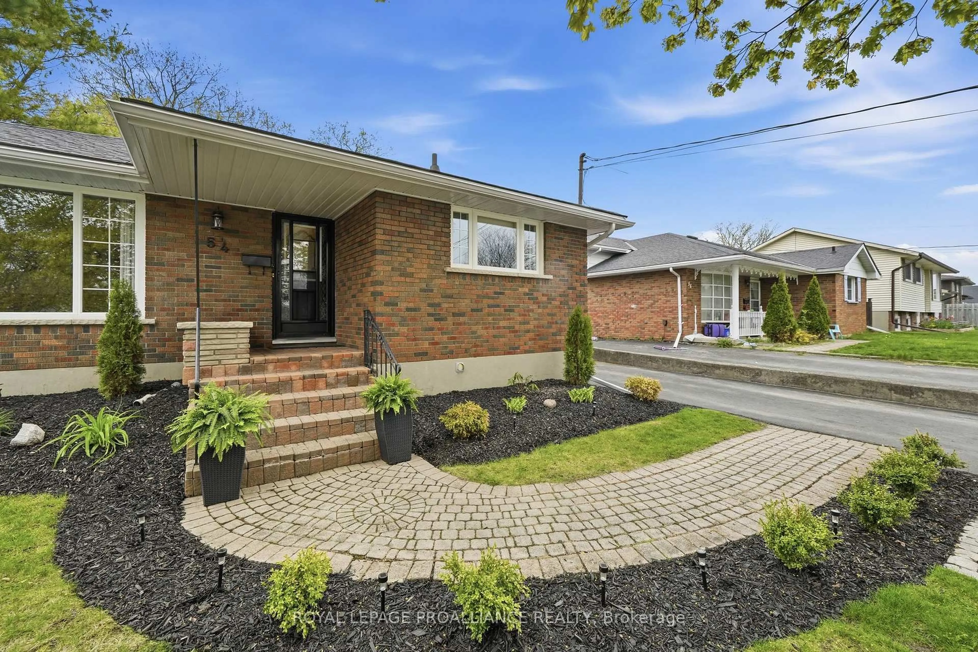Home with brick exterior material, street for 54 Craig St, Belleville Ontario K8P 2K1