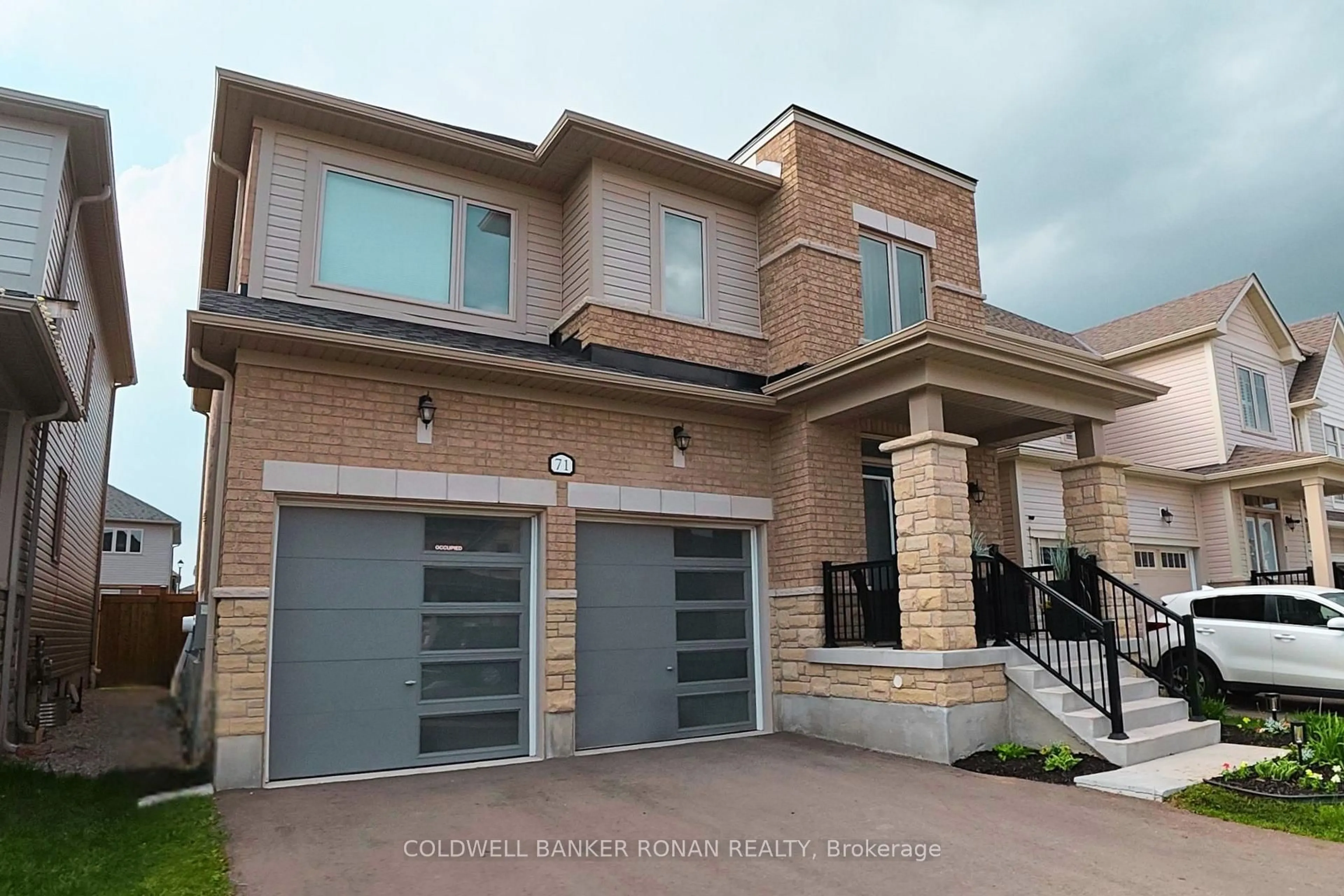 Home with brick exterior material, street for 71 Harpin Way, Centre Wellington Ontario N1M 0H8
