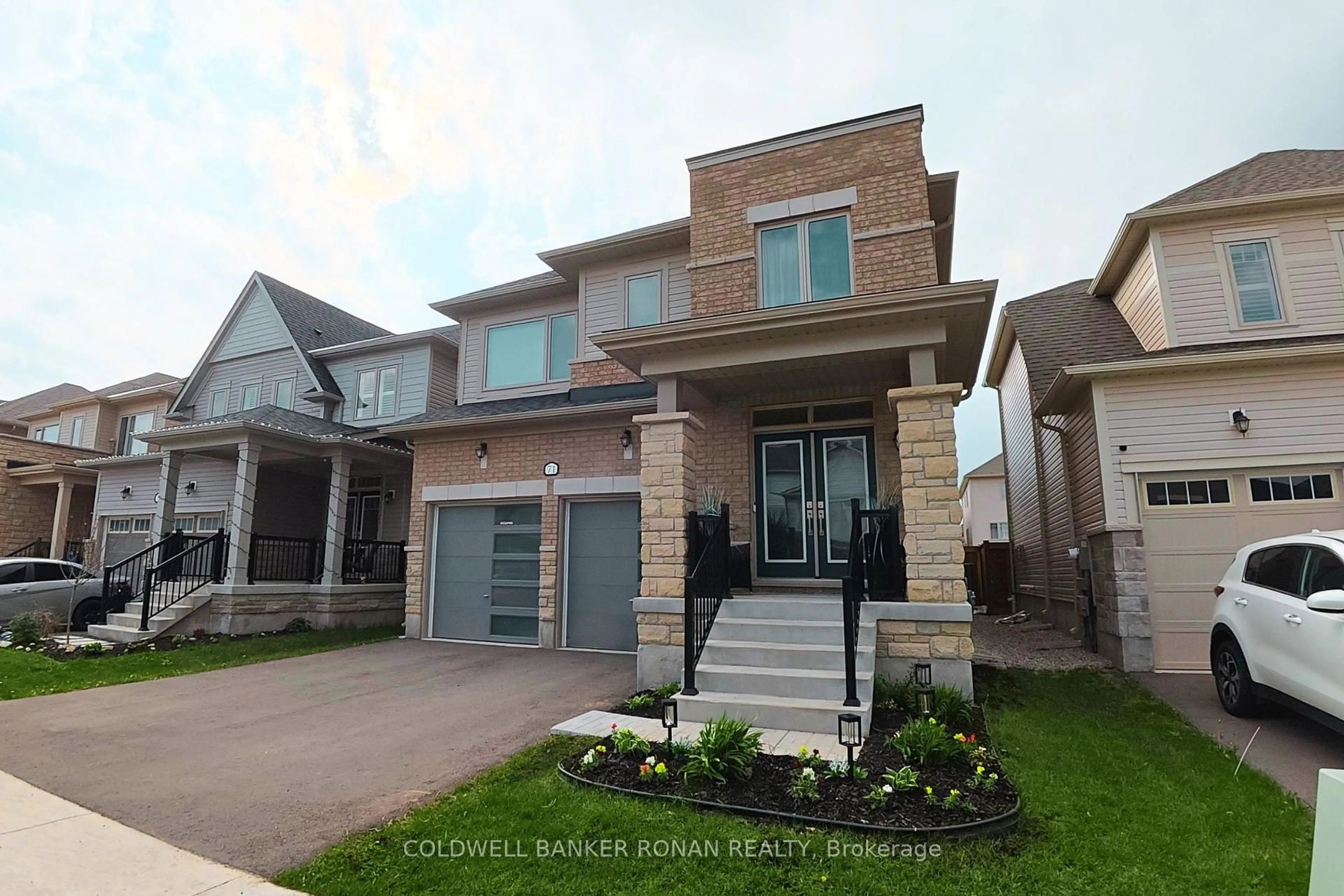 Home with brick exterior material, street for 71 Harpin Way, Centre Wellington Ontario N1M 0H8