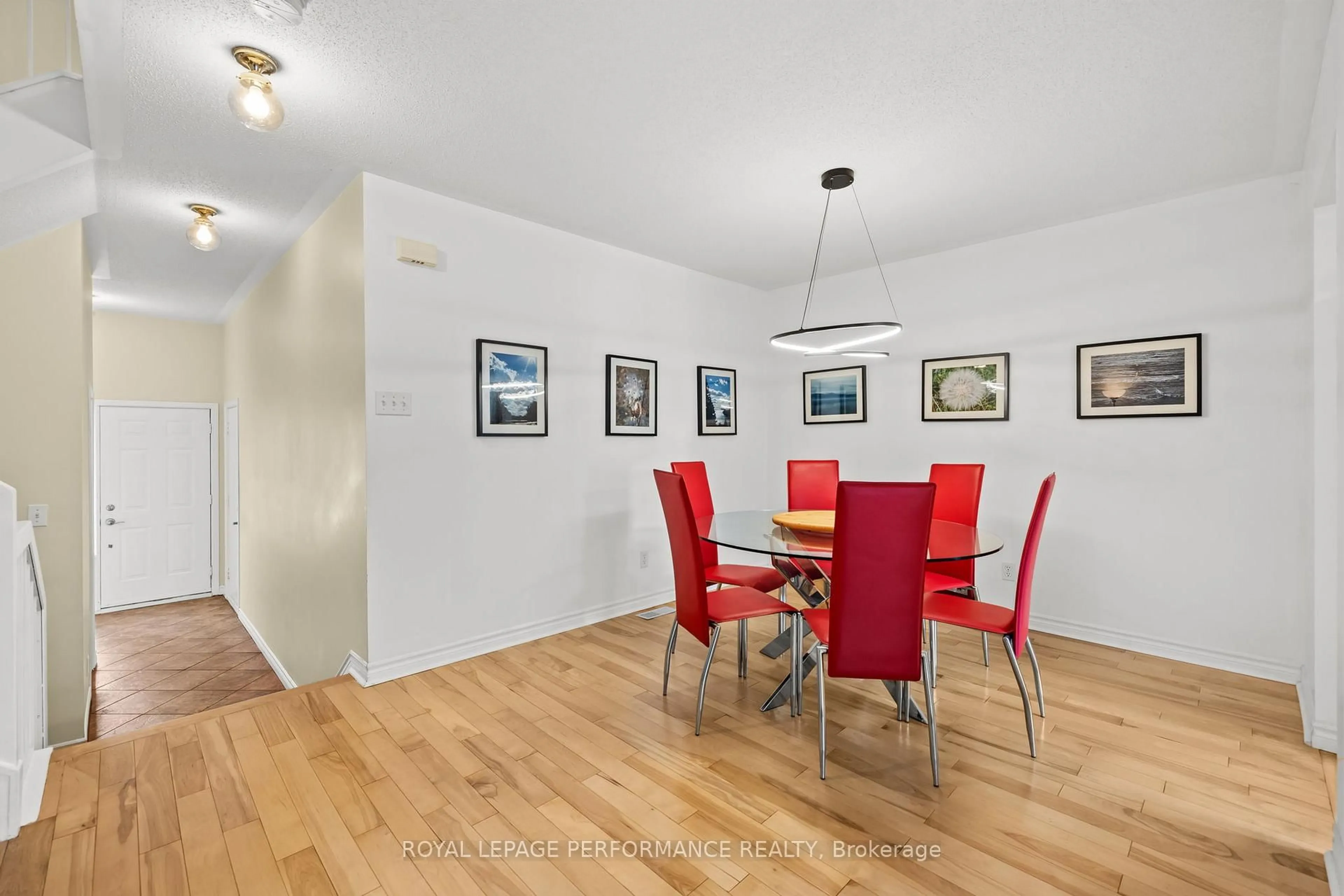 Dining room, wood/laminate floor for 6420 Sablewood Pl, Ottawa Ontario K1C 7L7