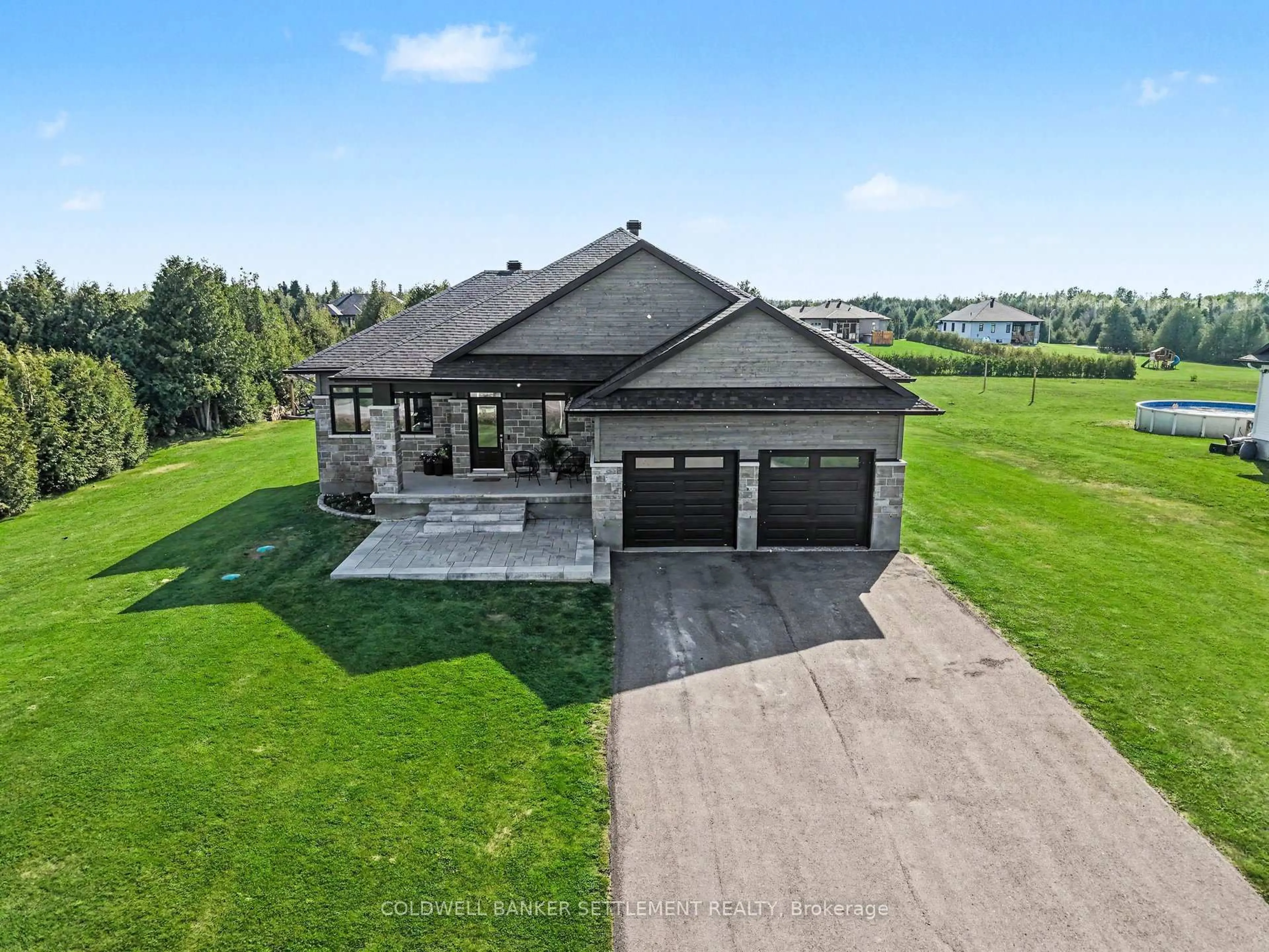 A pic from outside/outdoor area/front of a property/back of a property/a pic from drone, water/lake/river/ocean view for 155 Harold Jones Way, Ashton Ontario K0A 1B0