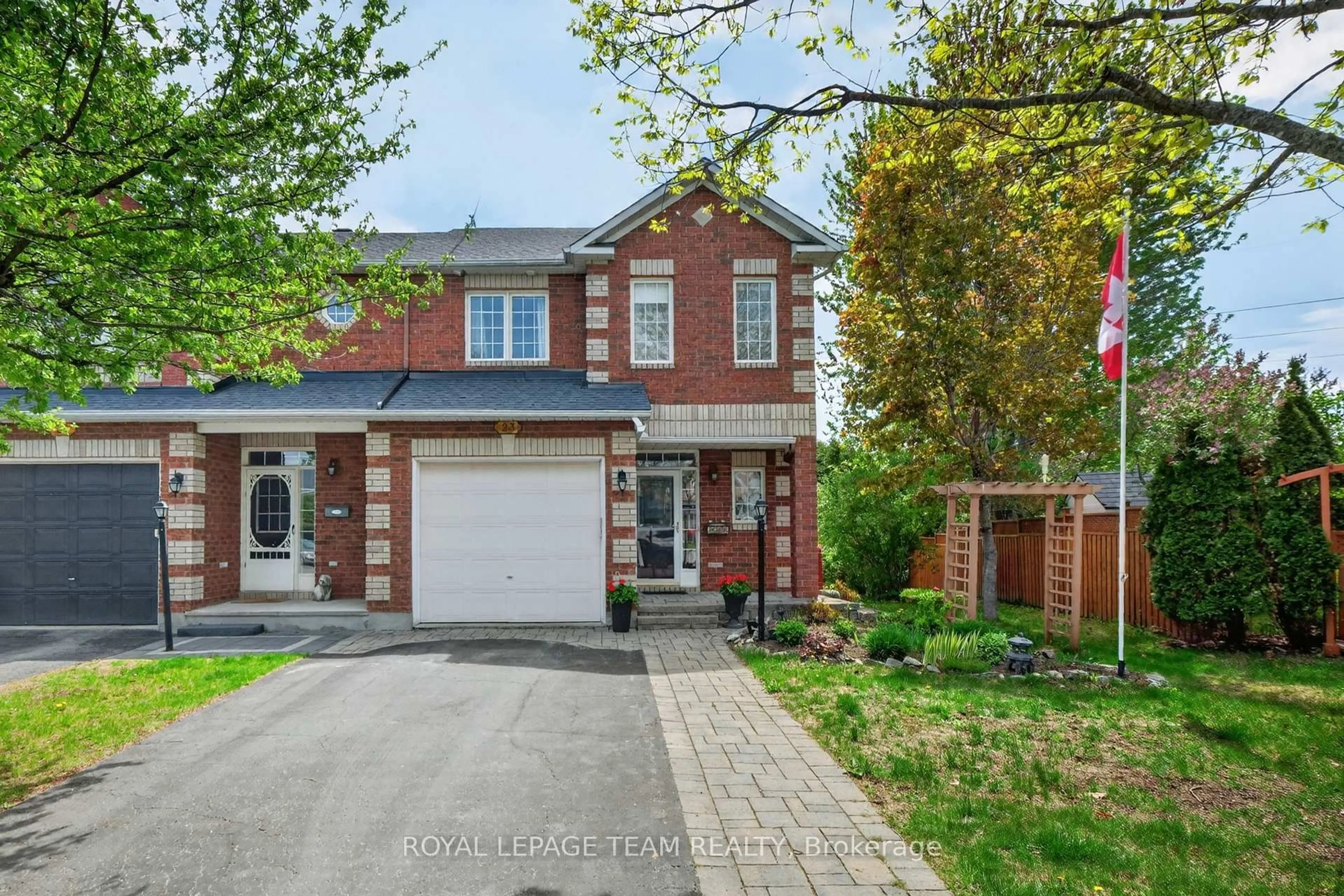 Home with brick exterior material, street for 23 Chantilly Gate, Stittsville Ontario K2S 2B1