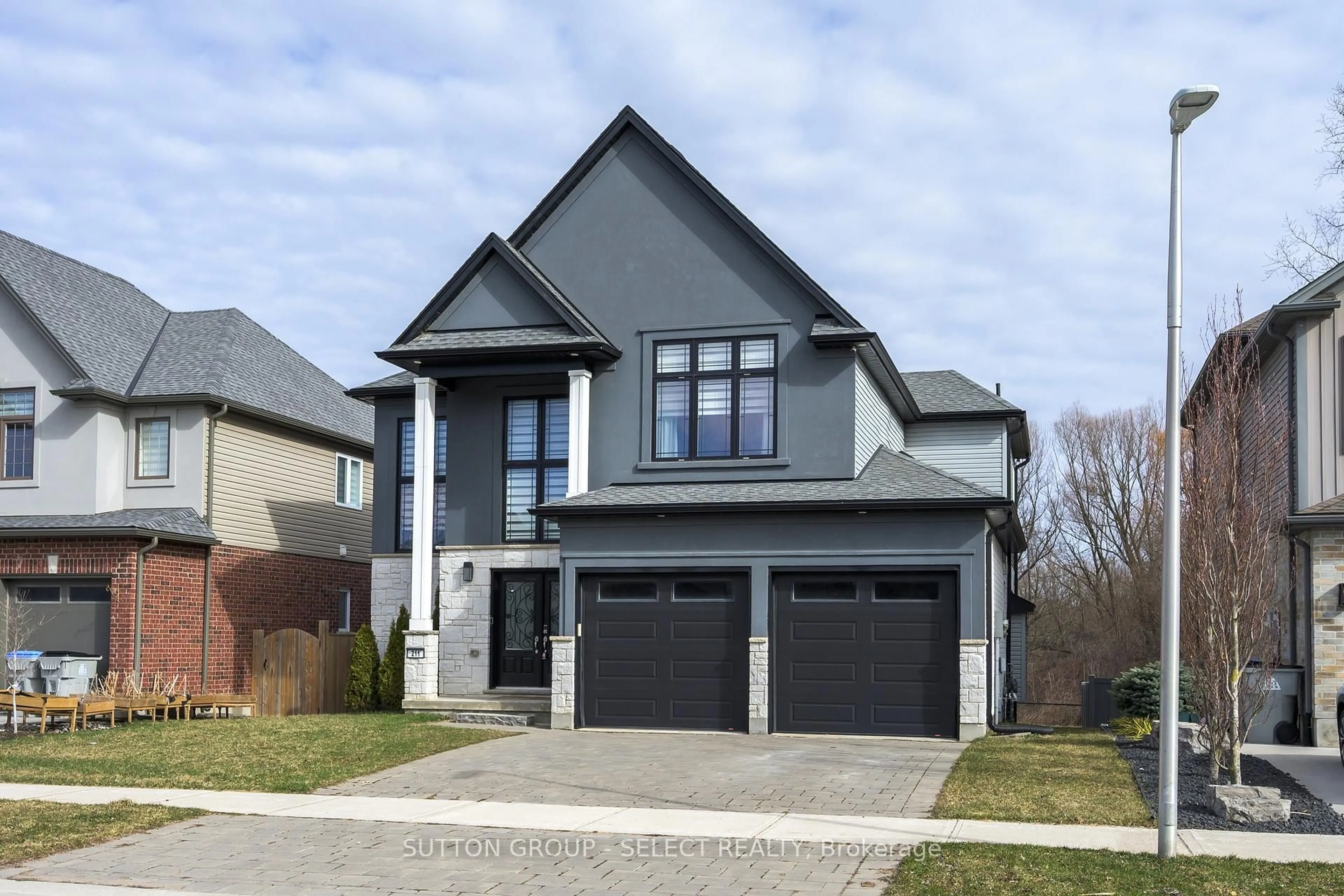Home with brick exterior material, street for 211 Union Ave, Middlesex Centre Ontario N0L 1R0