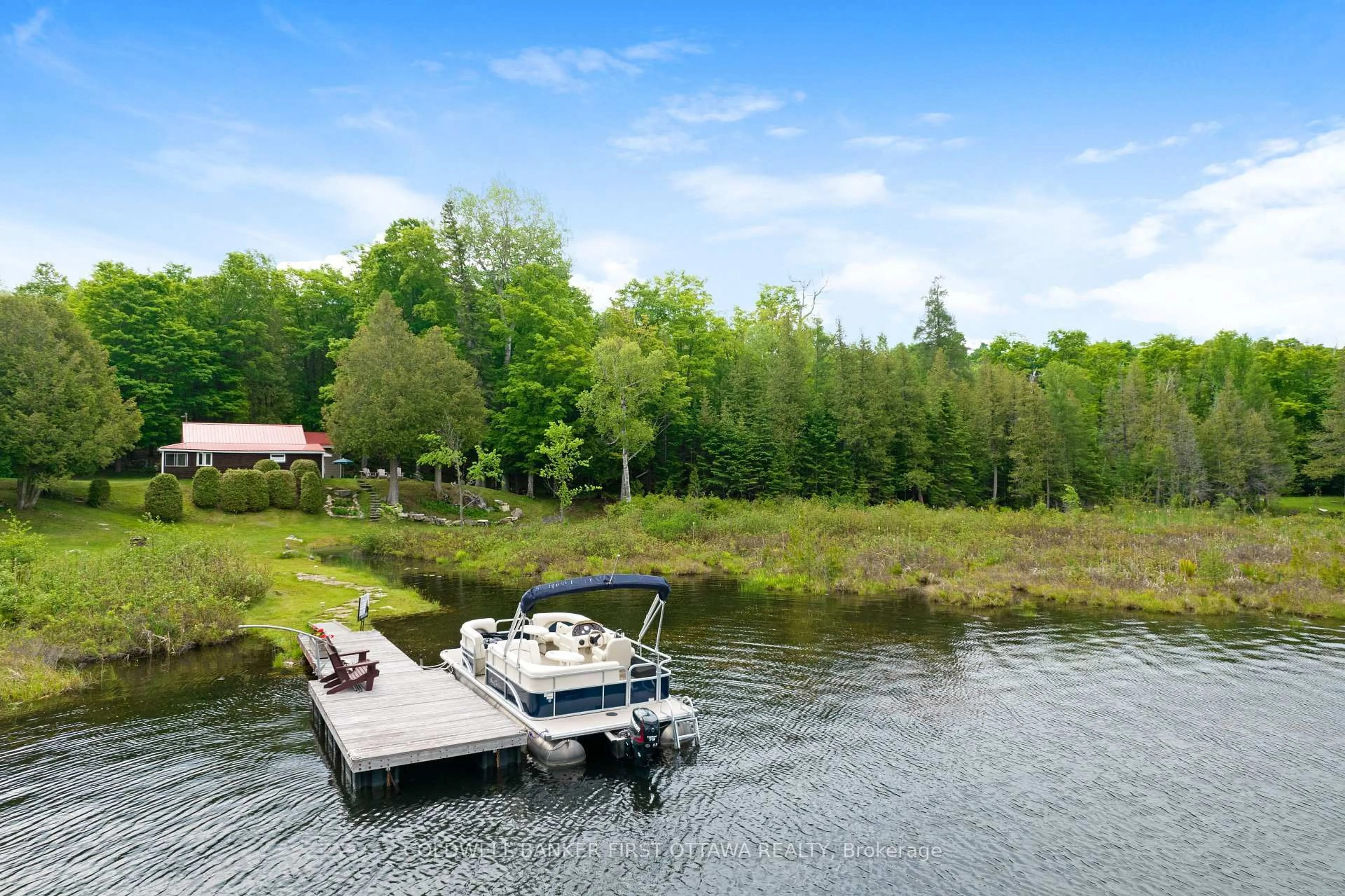 A pic from outside/outdoor area/front of a property/back of a property/a pic from drone, water/lake/river/ocean view for 1025 ARCOL Rd, Ompah Ontario K0H 2J0