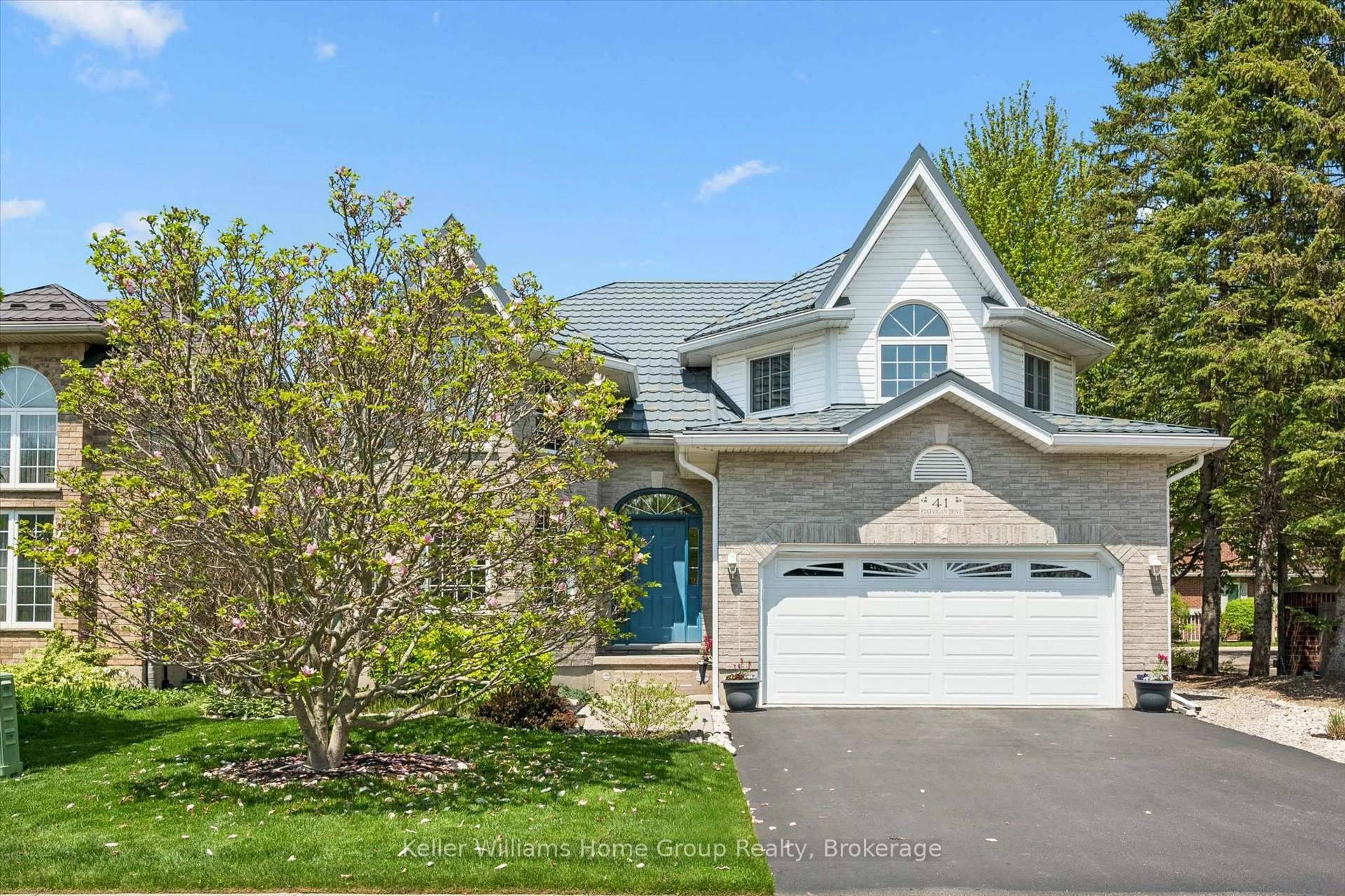 Home with vinyl exterior material, street for 41 Ptarmigan Dr, Guelph Ontario N1C 1B4