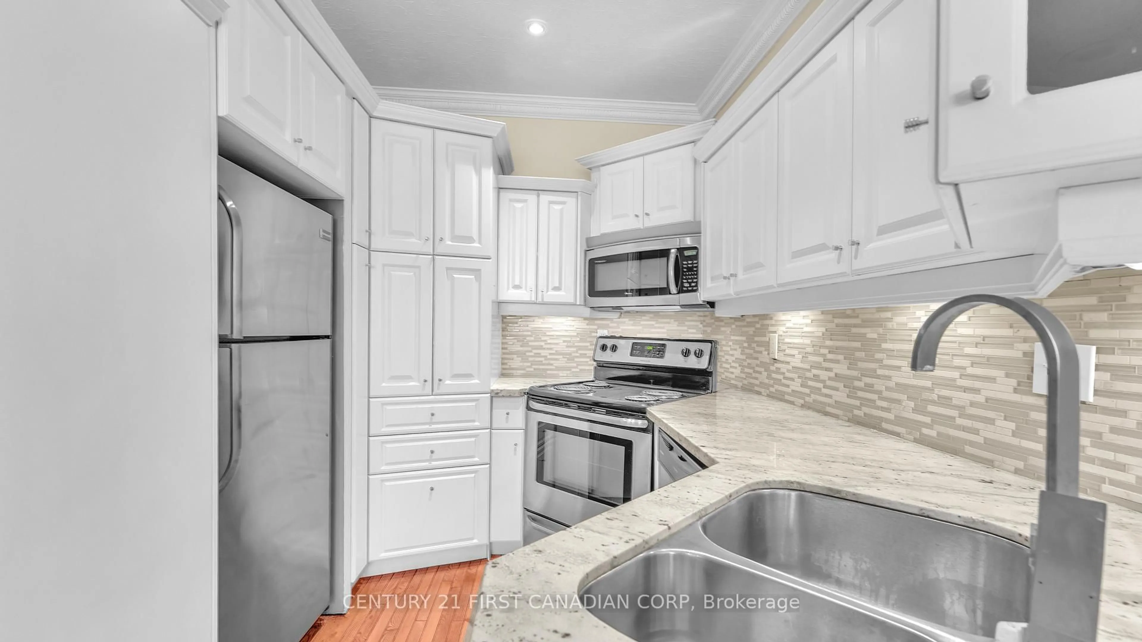 Standard kitchen, ceramic/tile floor for 389 Dundas St #2404, London East Ontario N6B 3L5