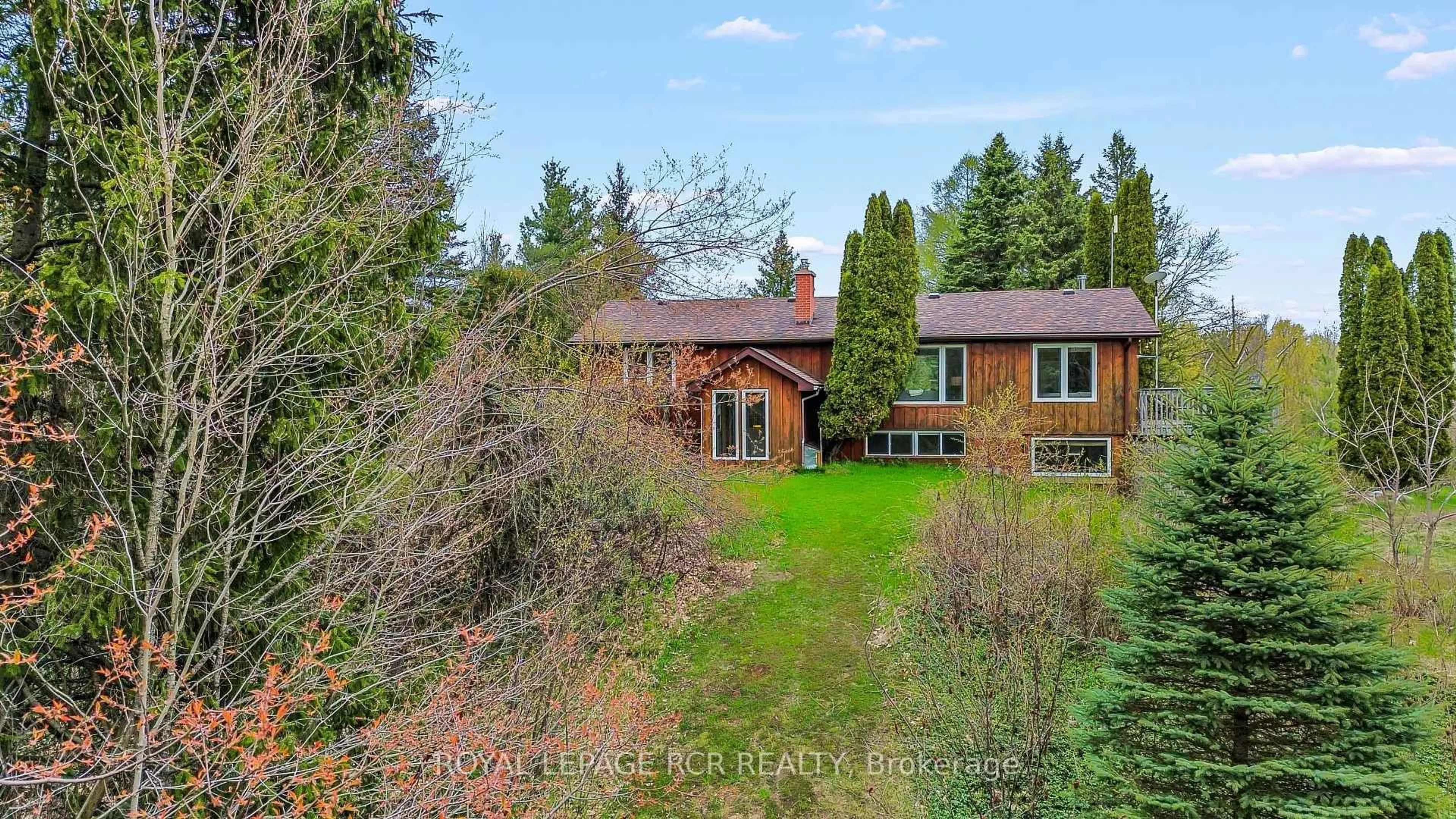 A pic from outside/outdoor area/front of a property/back of a property/a pic from drone, forest/trees view for 487072 30 Sdrd, Mono Ontario L9V 1G8