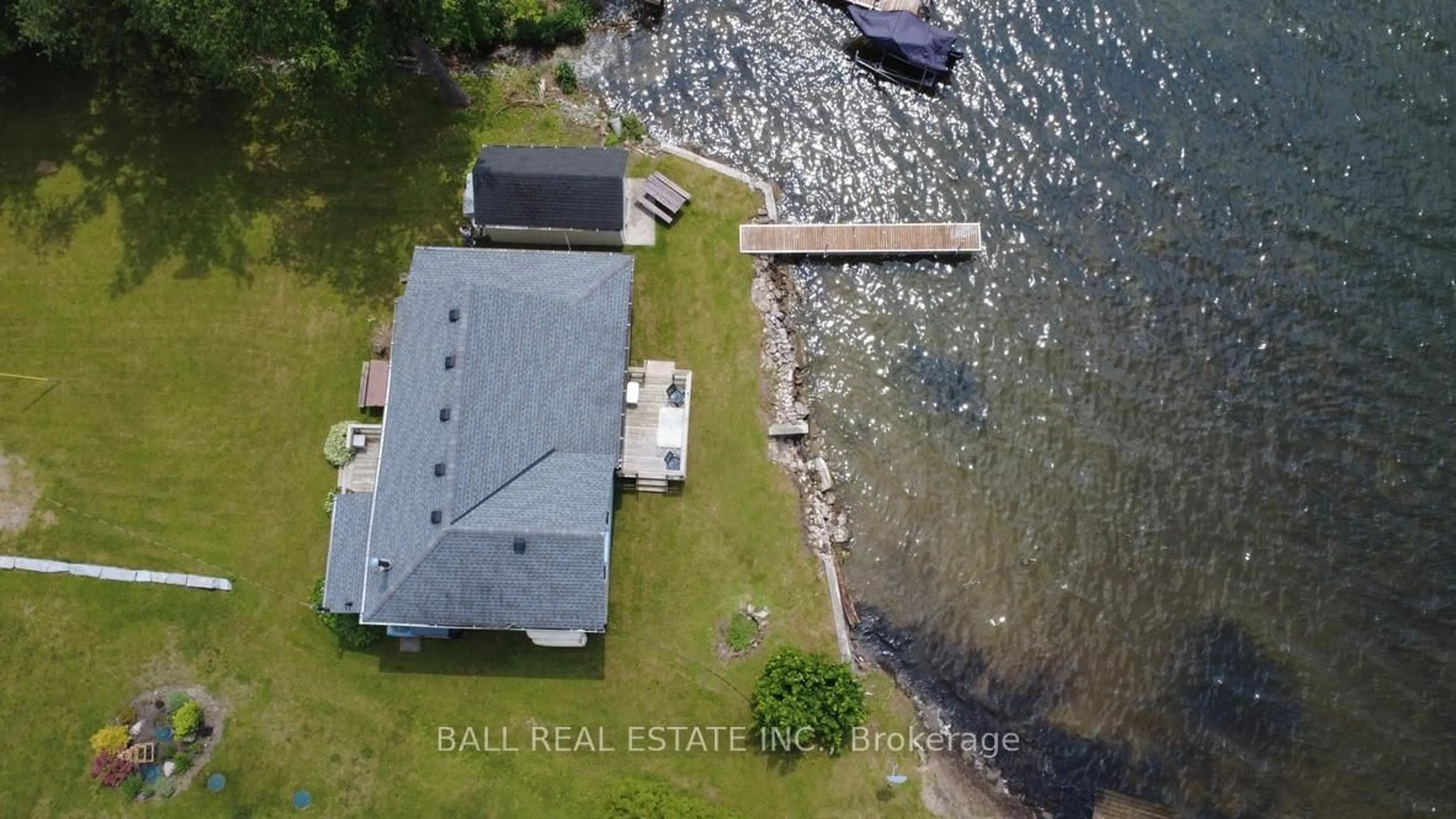 A pic from outside/outdoor area/front of a property/back of a property/a pic from drone, water/lake/river/ocean view for 654 Hatton Ave, Selwyn Ontario K0L 1H0