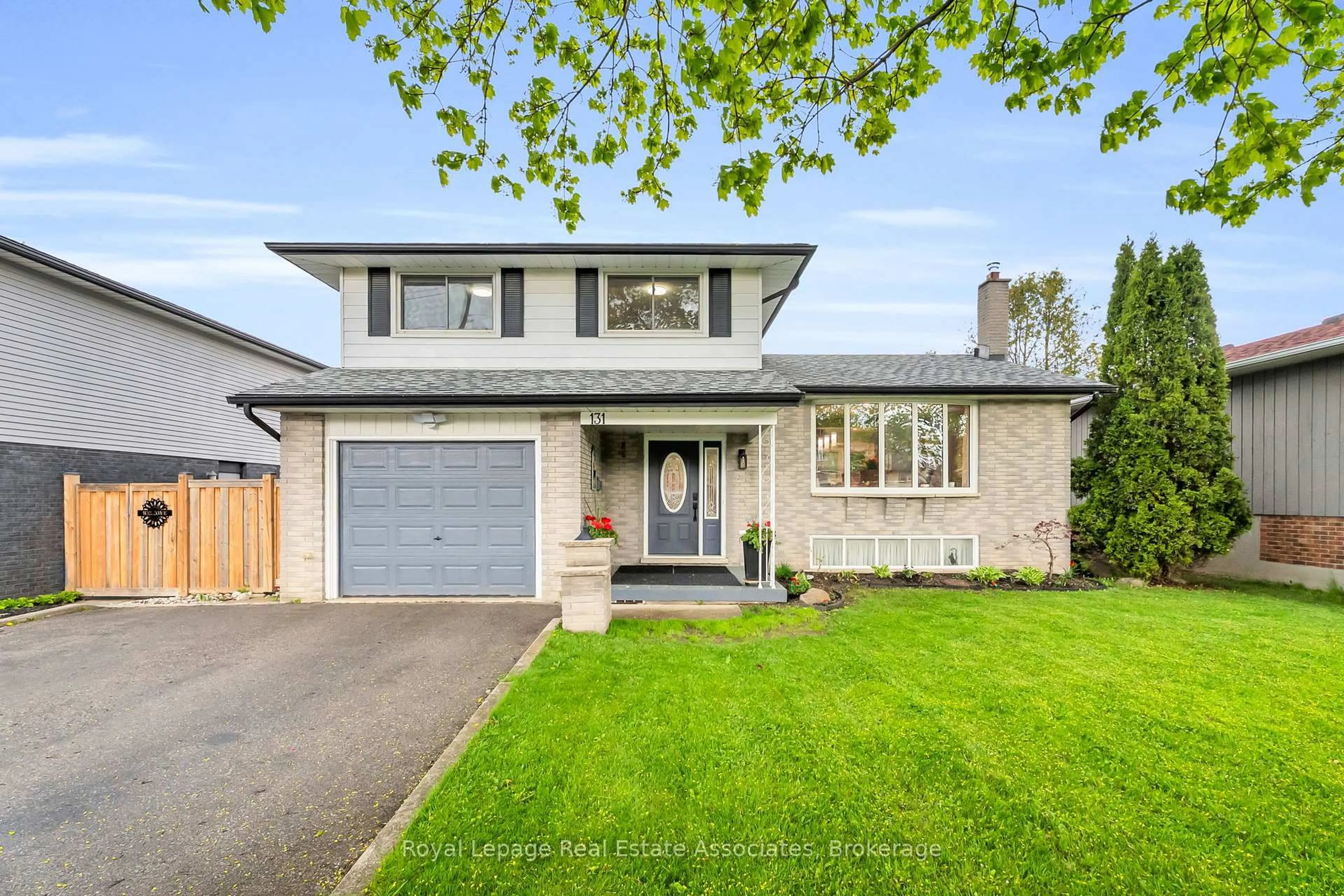 Home with vinyl exterior material, street for 131 Fife Rd, Guelph Ontario N1H 6Y1