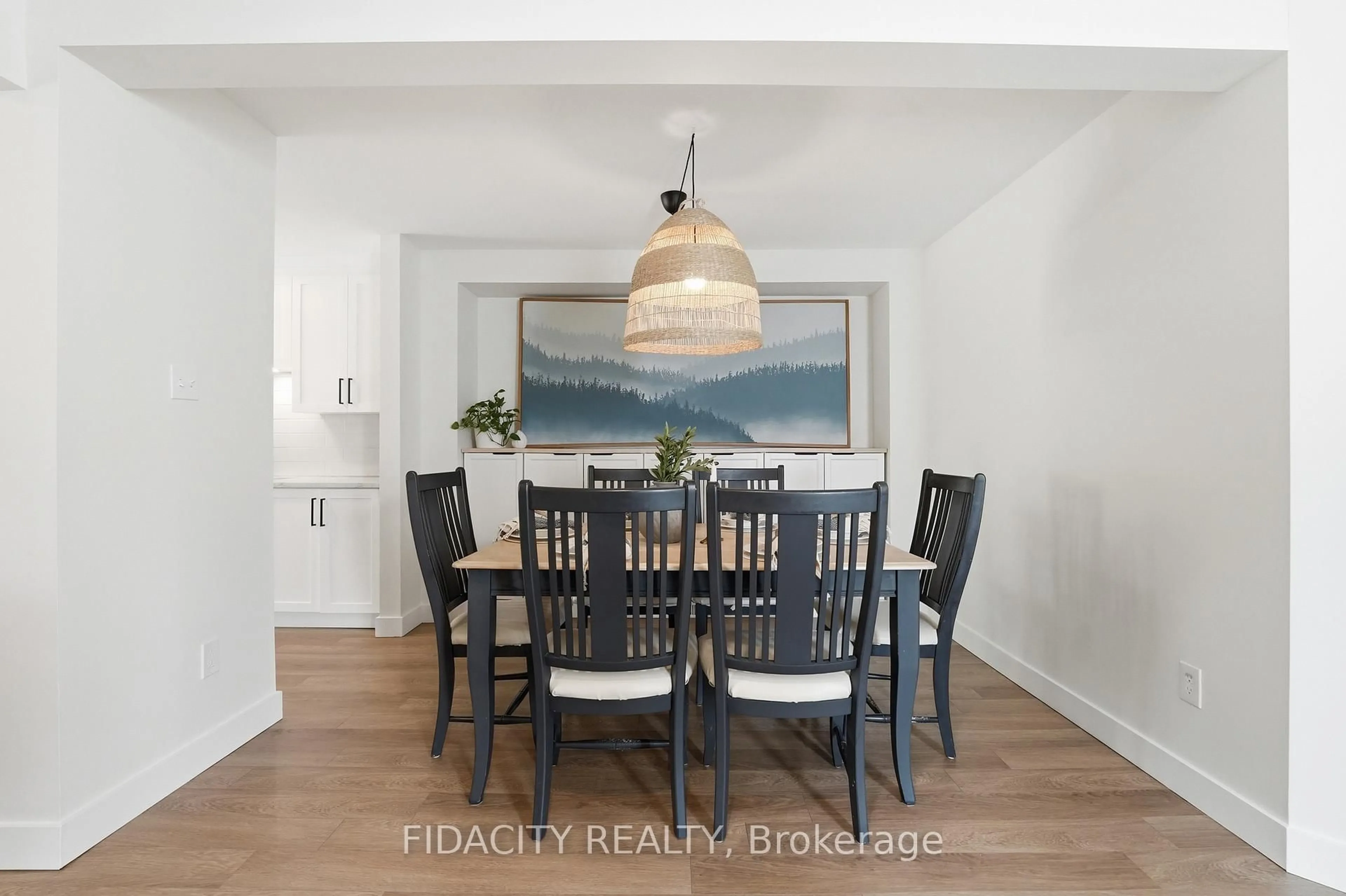 Dining room, wood/laminate floor for 80 Robarts Cres, Ottawa Ontario K2L 4A5