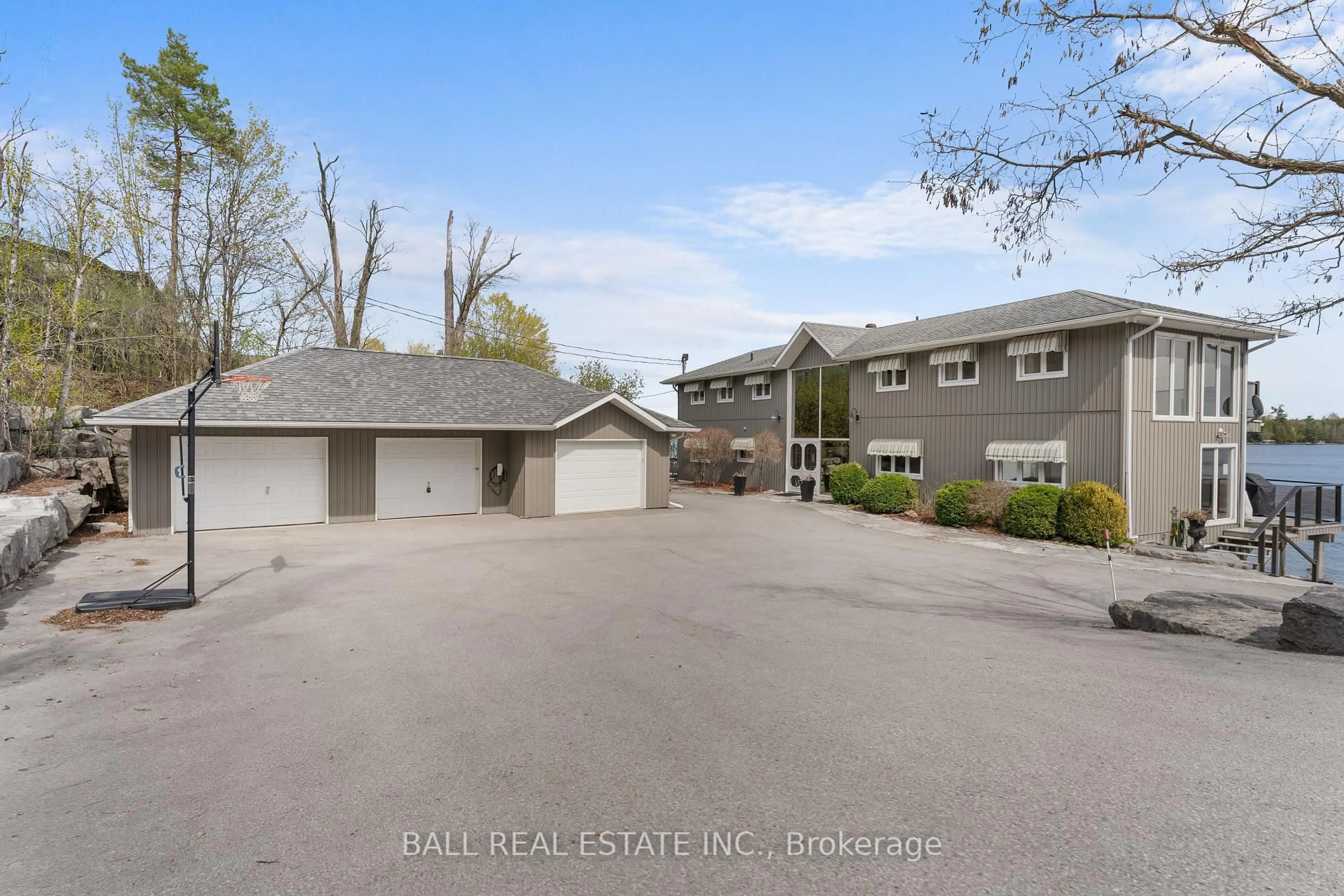 A pic from outside/outdoor area/front of a property/back of a property/a pic from drone, street for 392 County Rd 36, Trent Lakes Ontario K0M 1A0