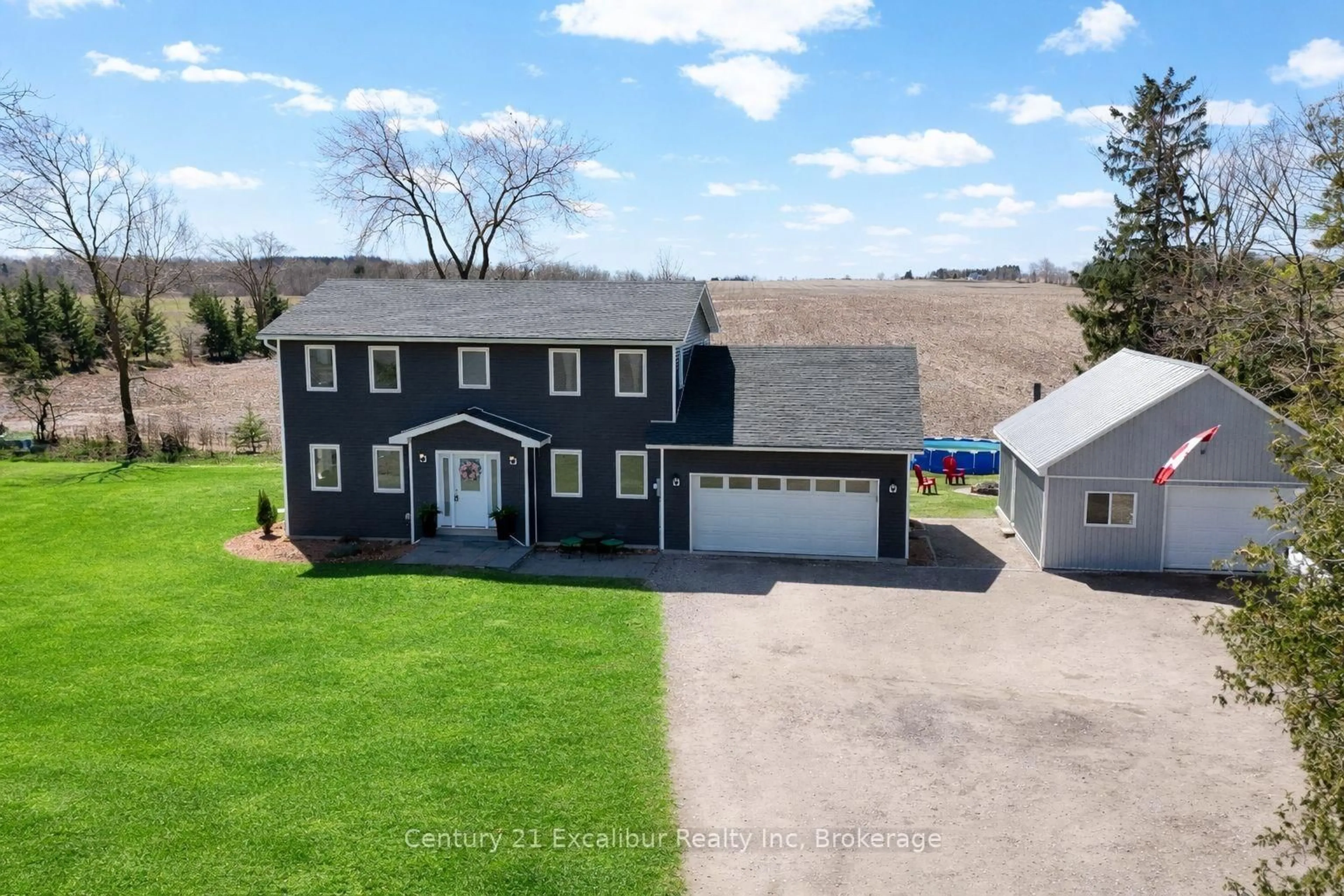 A pic from outside/outdoor area/front of a property/back of a property/a pic from drone, street for 7104 Sixth line Rd, Centre Wellington Ontario N0B 1J0