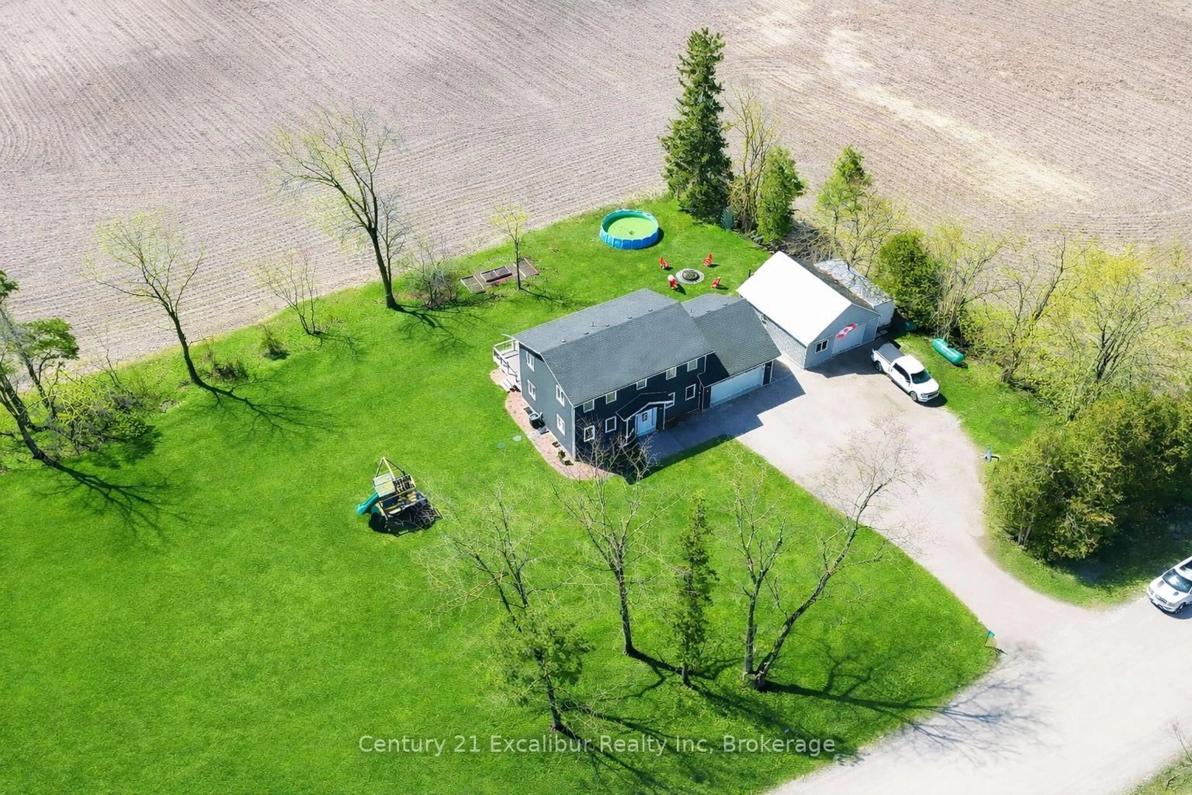 A pic from outside/outdoor area/front of a property/back of a property/a pic from drone, water/lake/river/ocean view for 7104 Sixth line Rd, Centre Wellington Ontario N0B 1J0