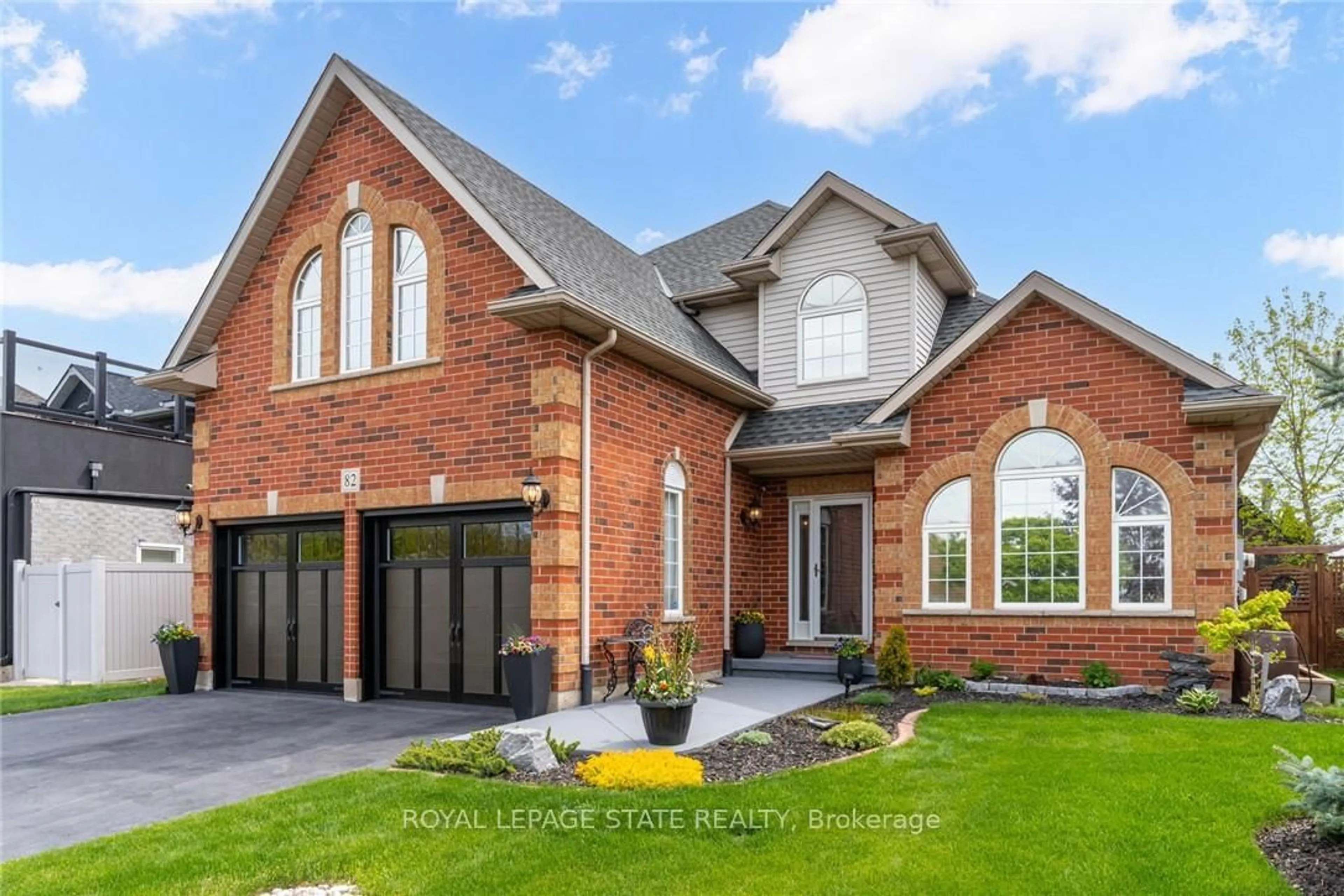 Home with brick exterior material, street for 82 Vansickle Rd, St. Catharines Ontario L2S 3Y6