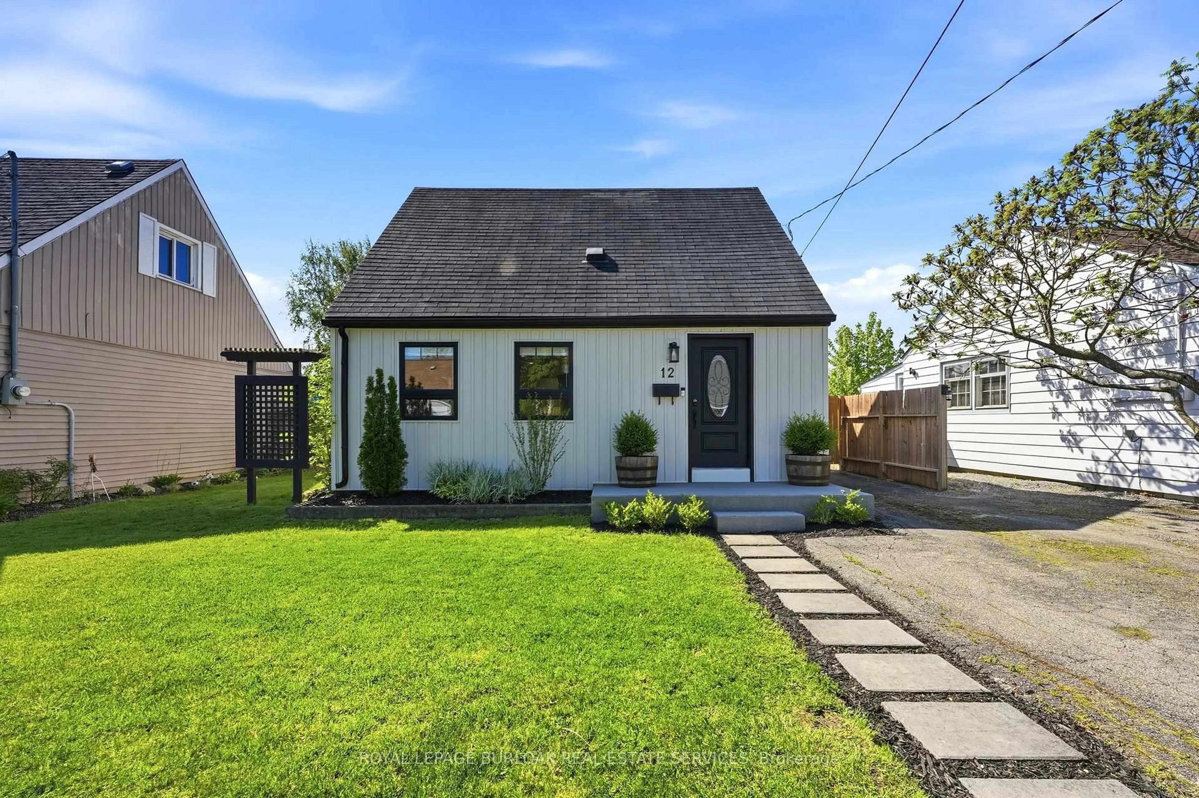 Home with vinyl exterior material, street for 12 Beverly St, St. Catharines Ontario L2P 2K1