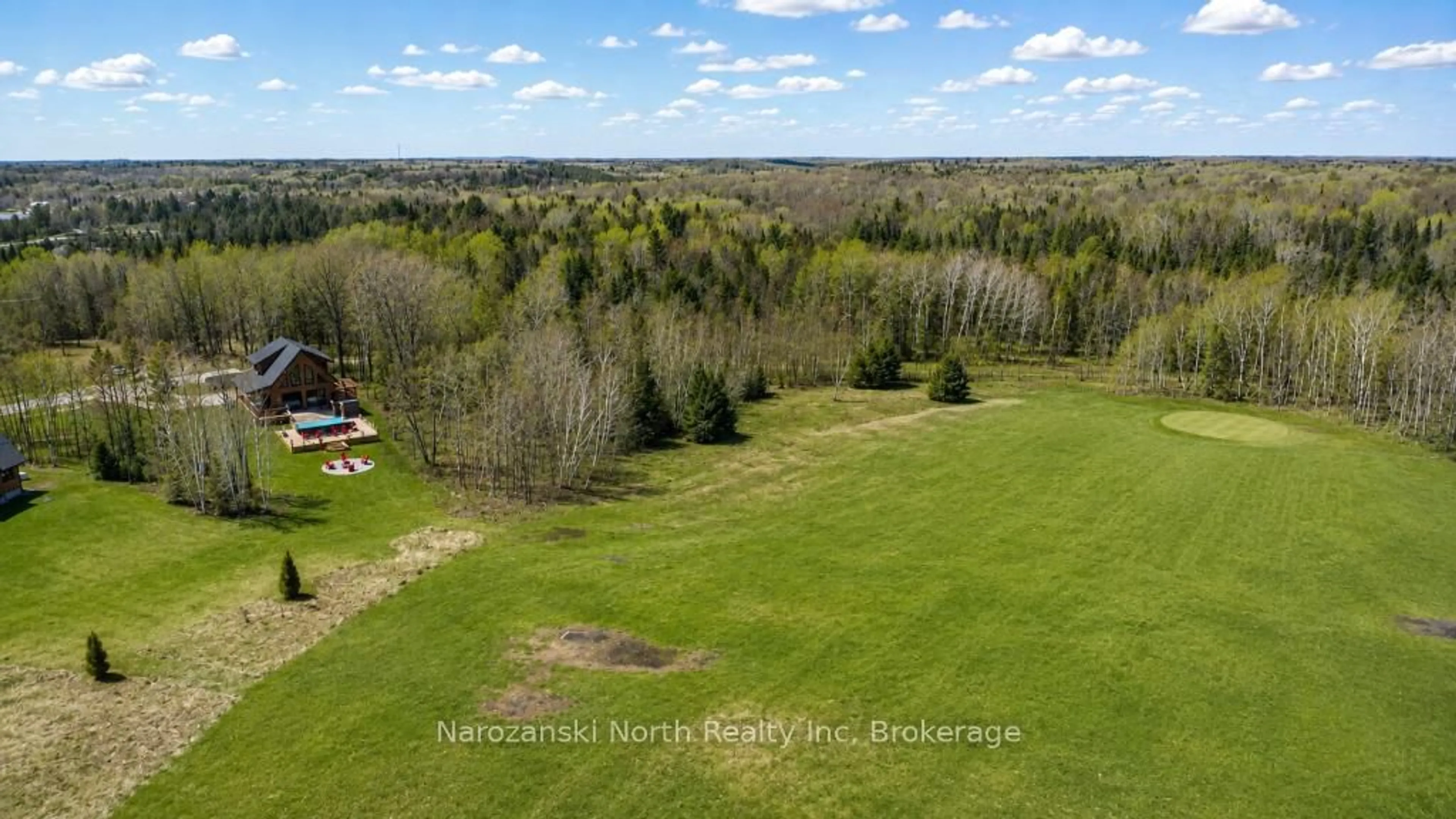 A pic from outside/outdoor area/front of a property/back of a property/a pic from drone, forest/trees view for 92 Harold Fryer Dr, French River Ontario P0M 2K0