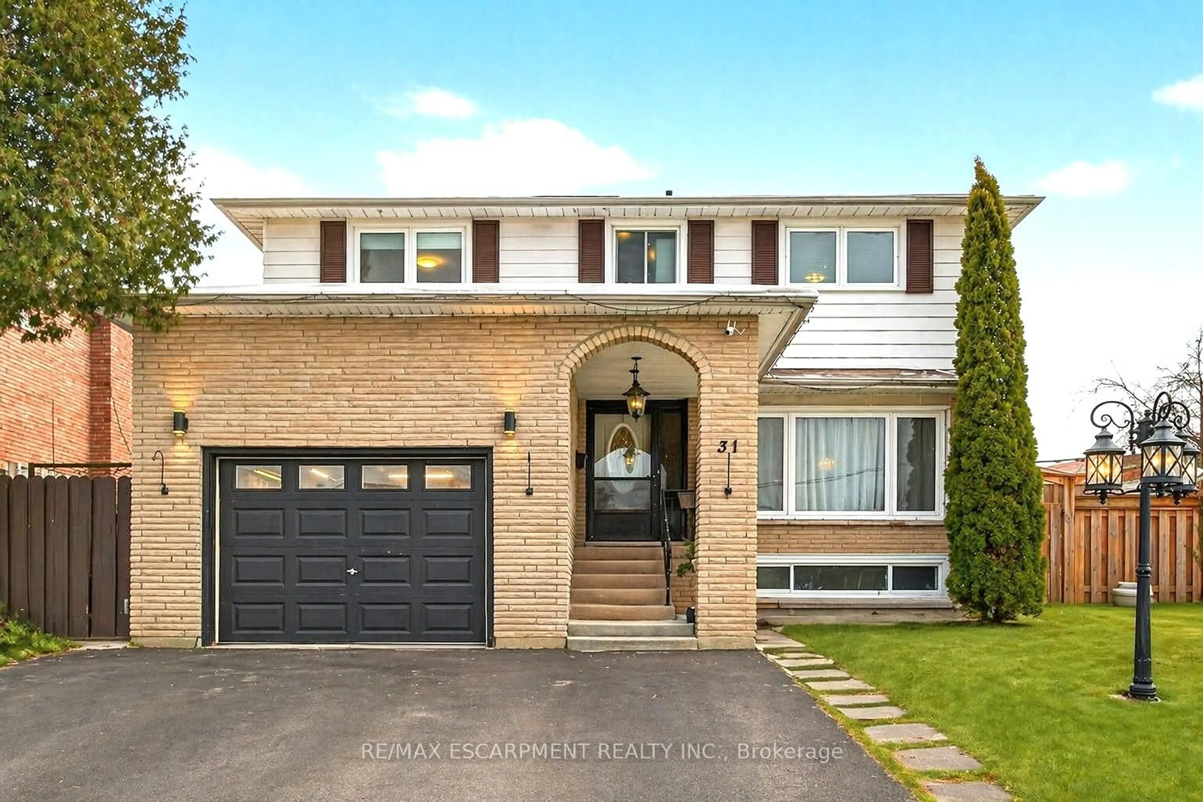 Home with brick exterior material, street for 31 Maynard St, Hamilton Ontario L9B 1R9